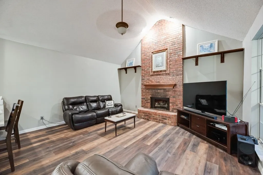 Features gas burning fireplace
