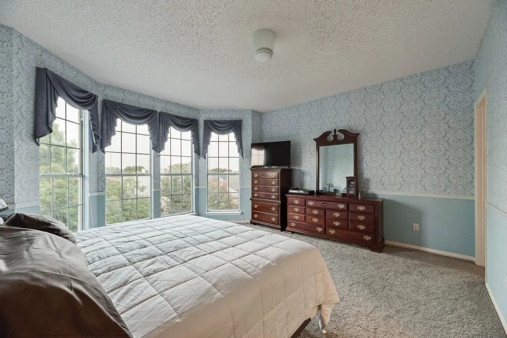 Primary bedroom​​‌​​​​‌​​‌‌​‌‌​​​‌‌​‌​‌​‌​​​‌​​ suite