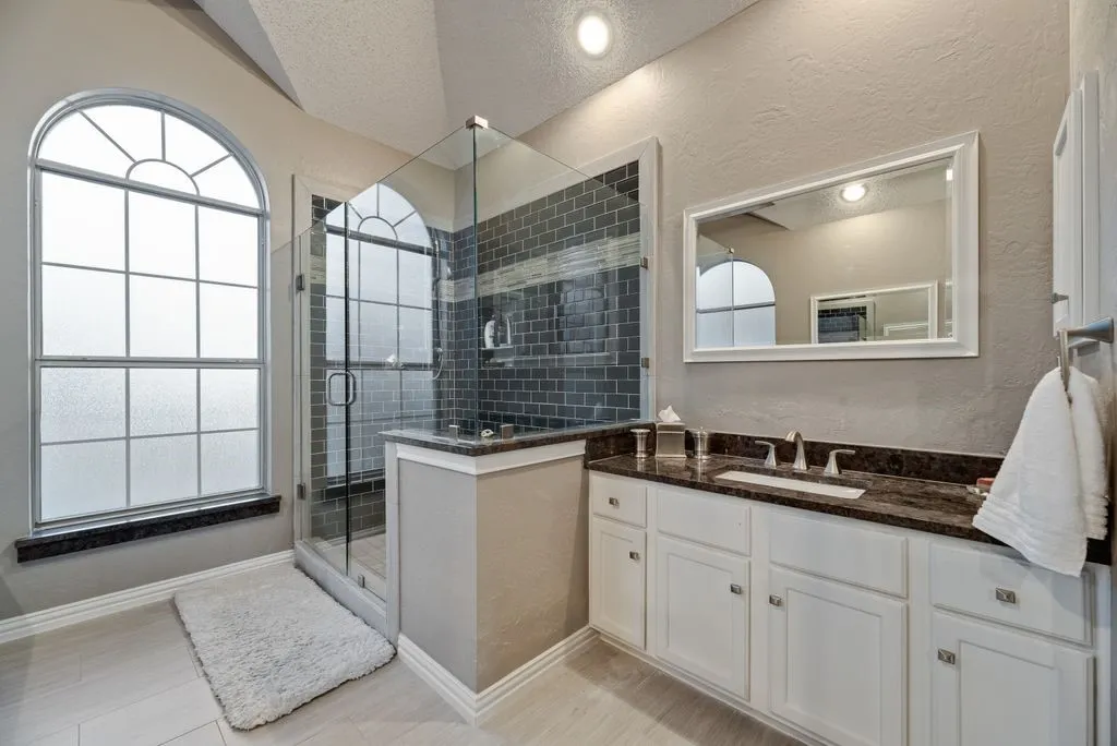 Primary bathroom with updated shower