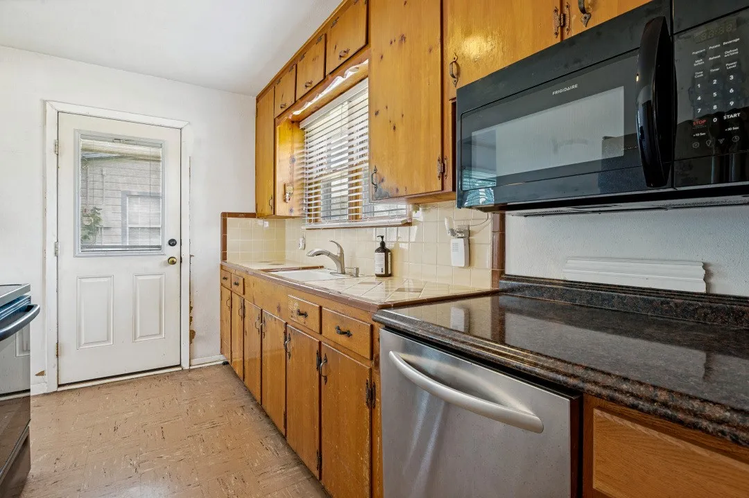 Kitchen featuring a covered porch entry
