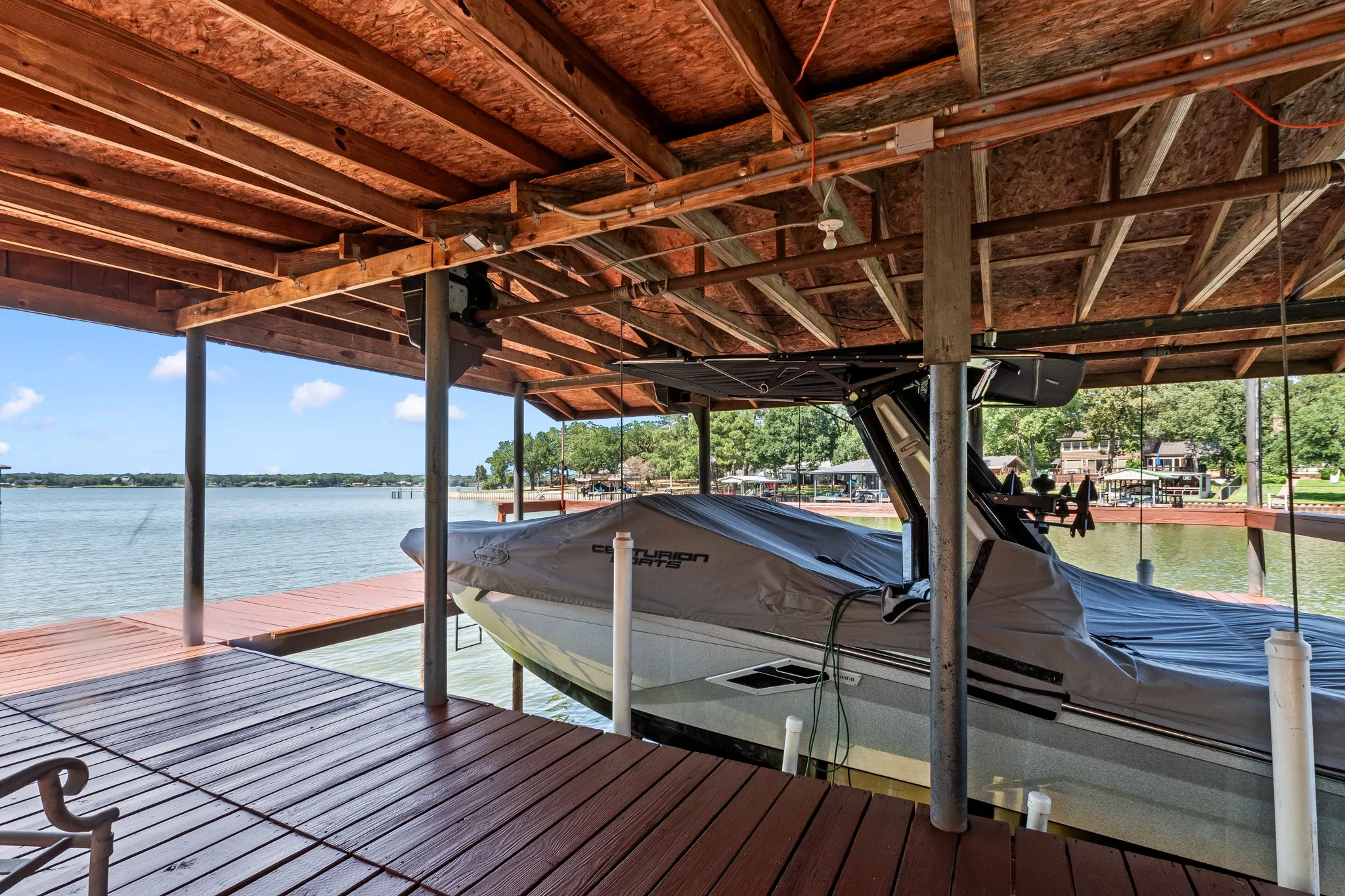 Boathouse includes two covered boat slips.