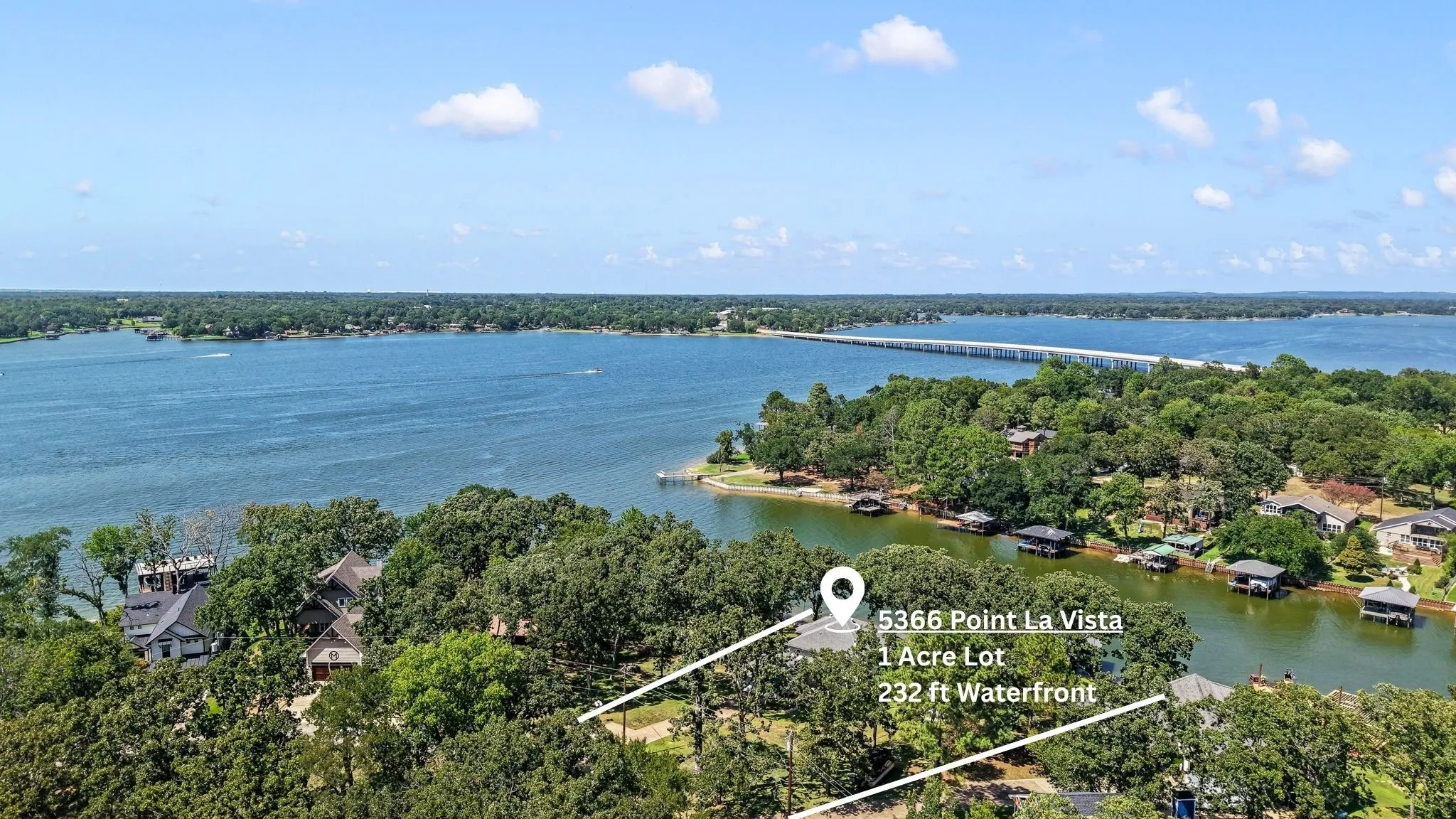 Situated on approximately 1 acre with 232 feet of shoreline