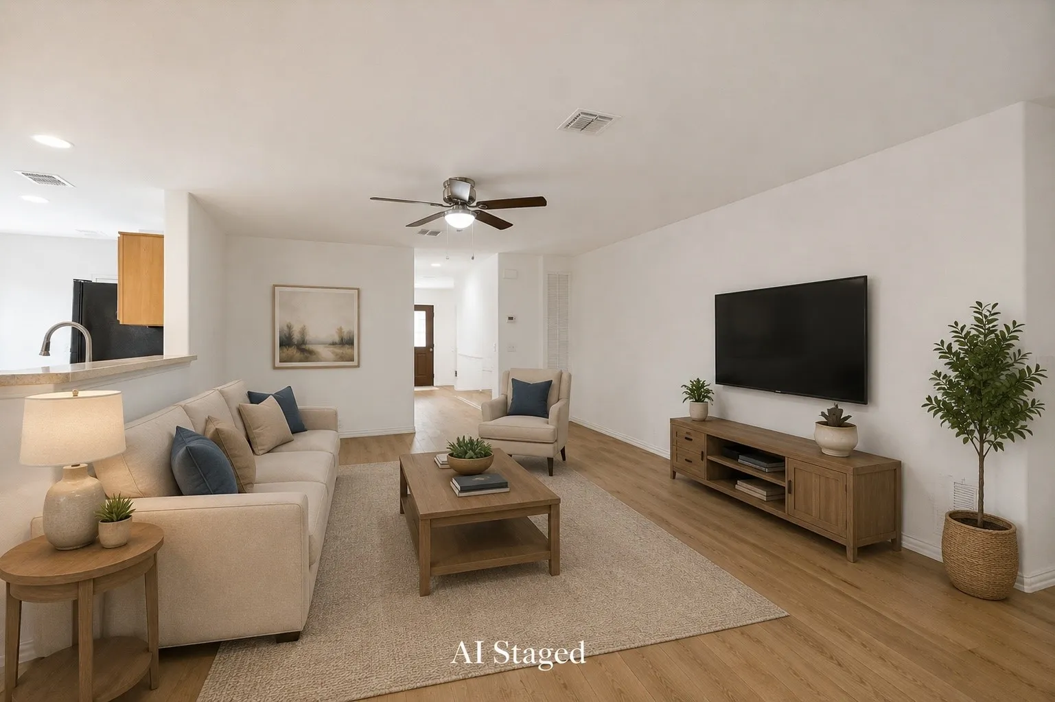 AI Staged - Spacious living area featuring wood-finish flooring, recessed lighting, and a ceiling fan with integrated lighting
