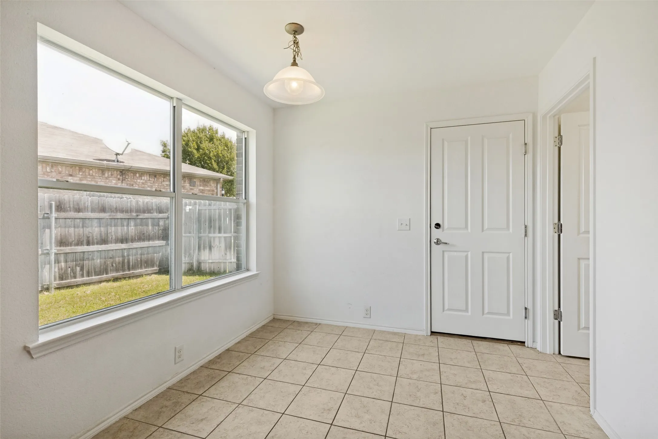 Breakfast area off of kitchen and garage.