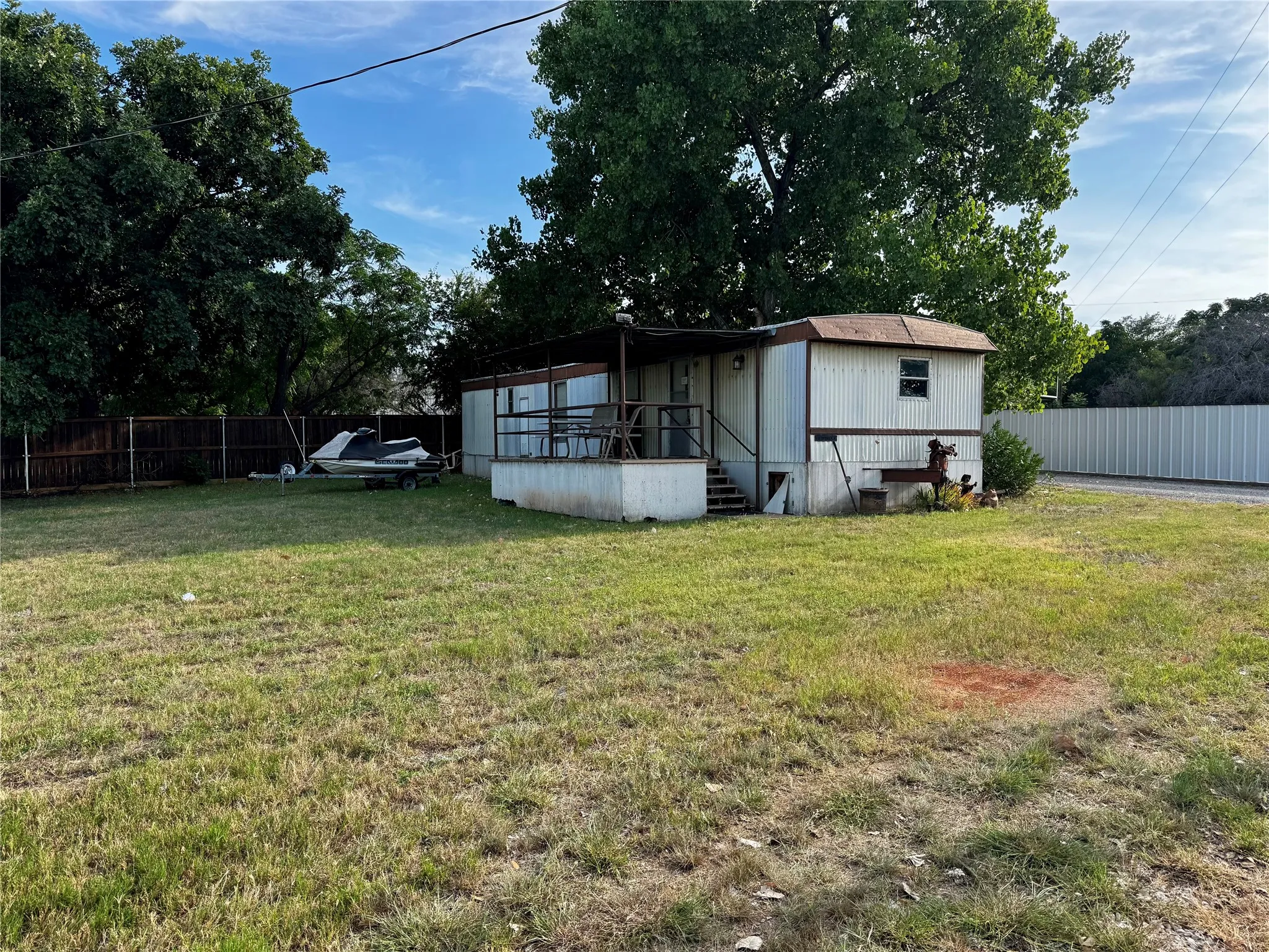 Mobile Home For Sale in Palo Pinto County , 1909 Buck Run, Graford, Texas 76449, 2 Bedroom, 1 Bathroom, Garage spaces, 728 Sqft, built in 1980, mls#21347450, Real Estate Agent in Graford, Homes For Sale in Palo Pinto county, Homes For Sale in Graford, Realtor in Graford Texas, Real Estate Brokerage Independent Realty Texas, Luminita Cordes Realtor