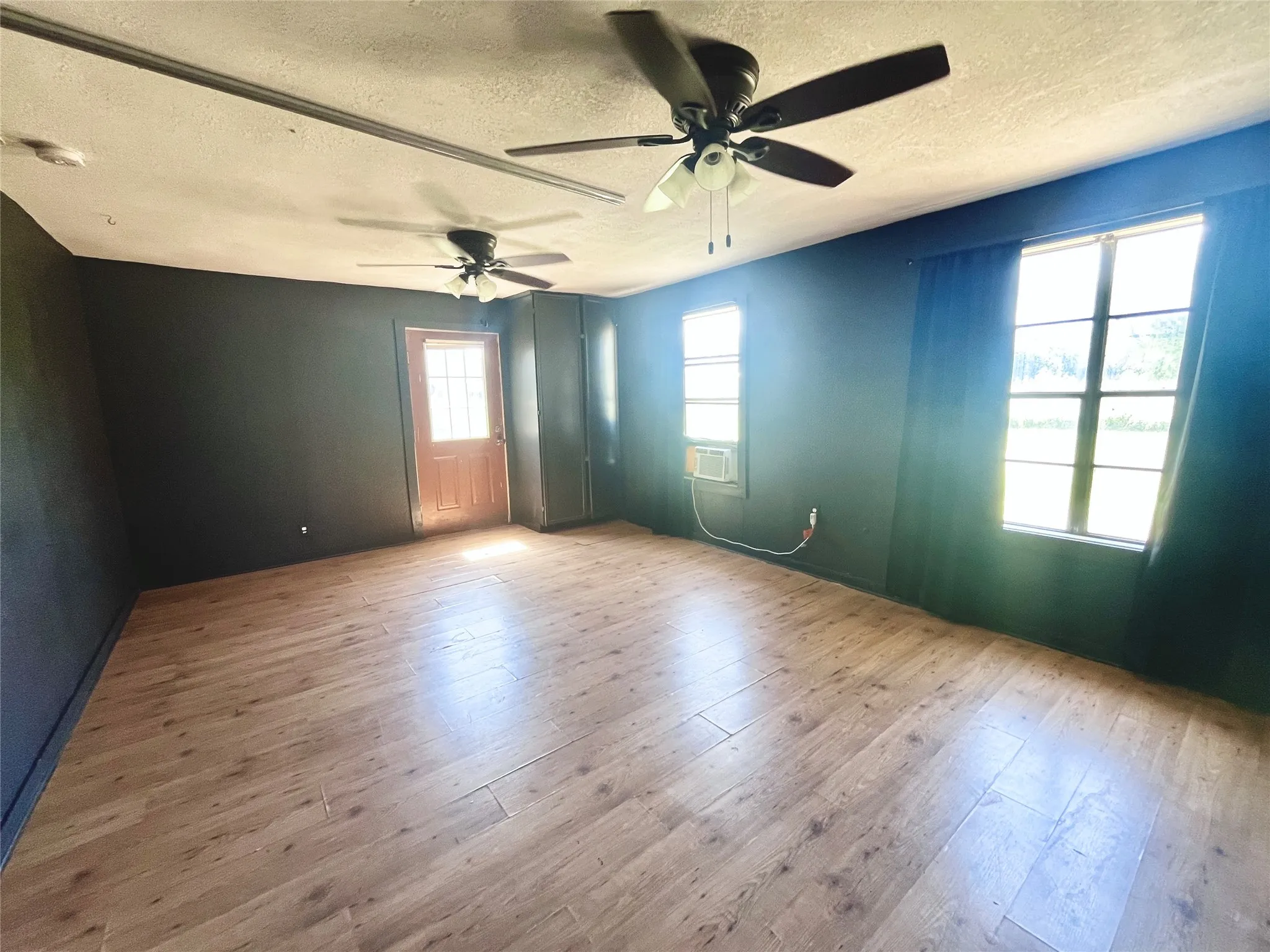 Private entrance can be utilized for a second business with rear parking, or as an owner's or executive suite.