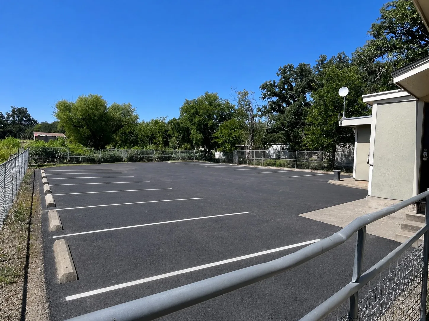 Potential rear parking with two separate entrances. (This photo is created using virtual staging software).