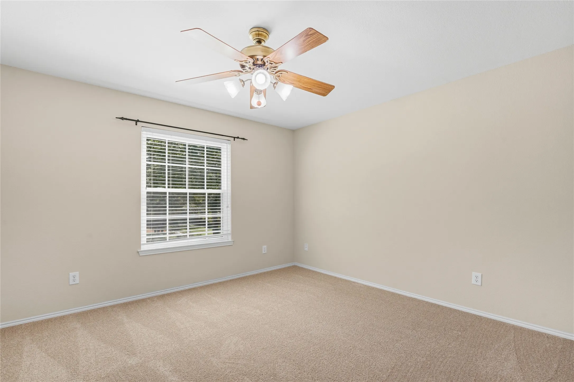 Neutral tone walls and carpeting create a versatile interior space