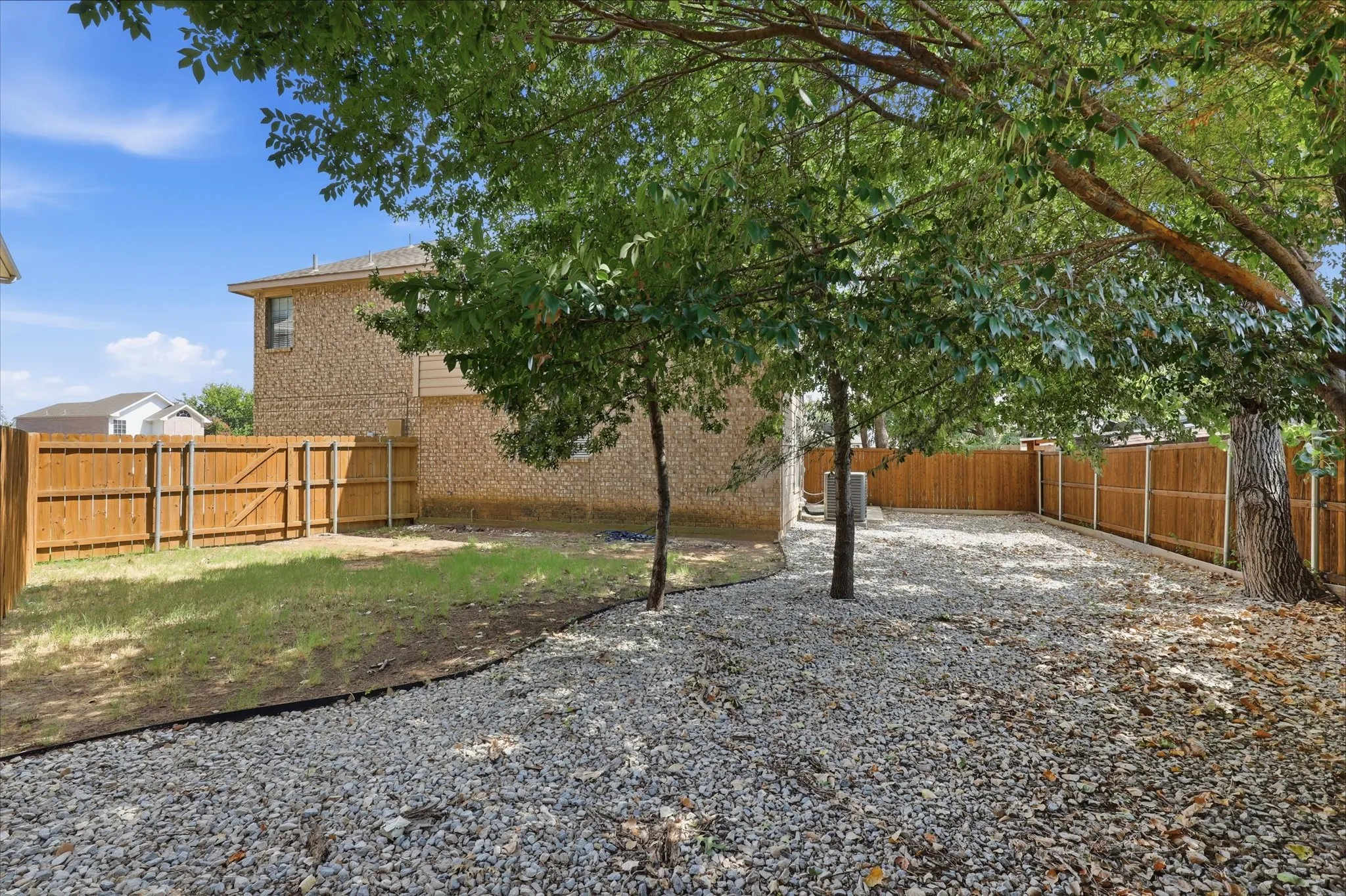 Spacious yard with new fence