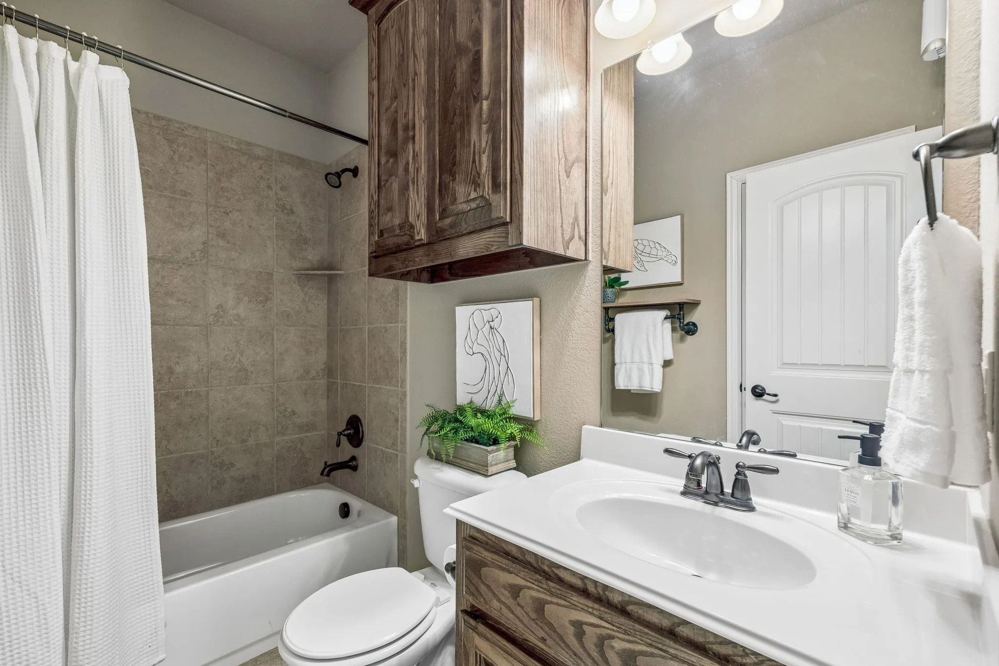 guest bath with access to guest bedroom