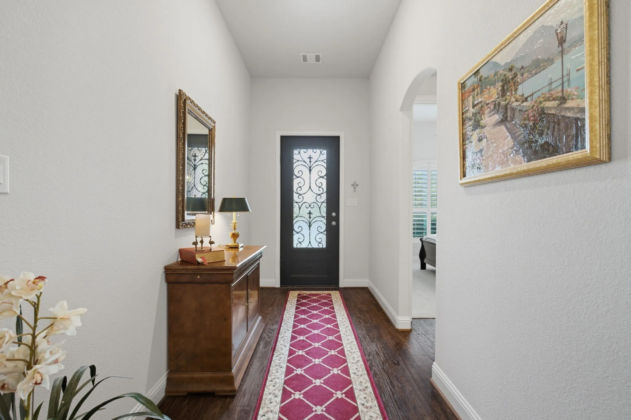 Lovely Entry and Upgraded Front door with Iron insert.