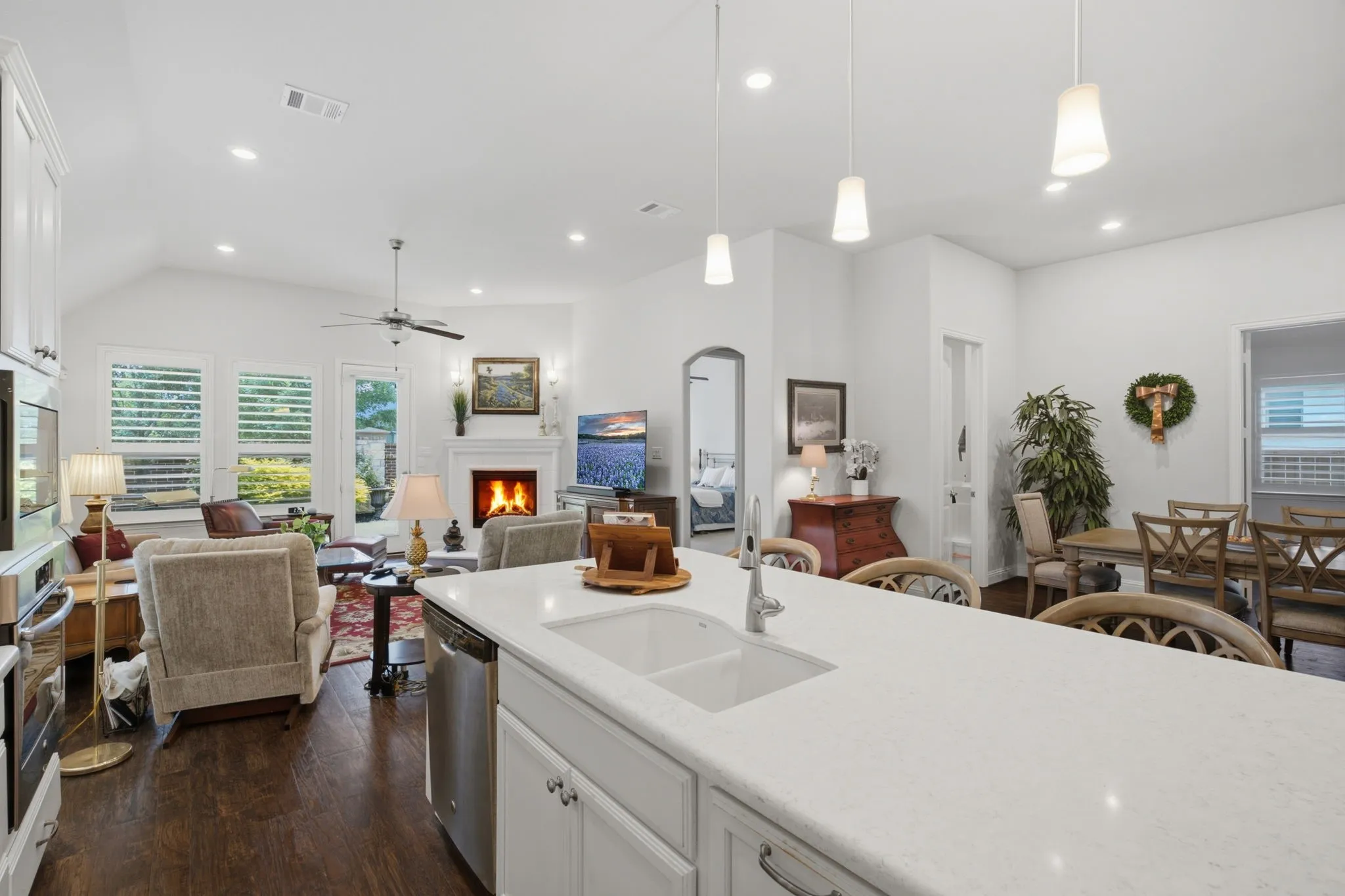 Family Room is open to the Kitchen with a lovely Gas Log Fireplace