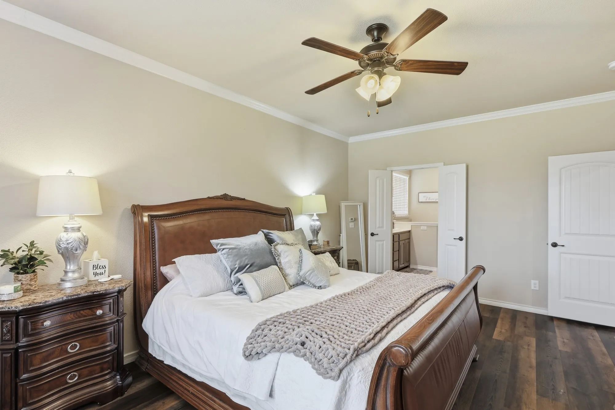 Nice size primary bedroom with ceiling fan and ensuite bathroom.