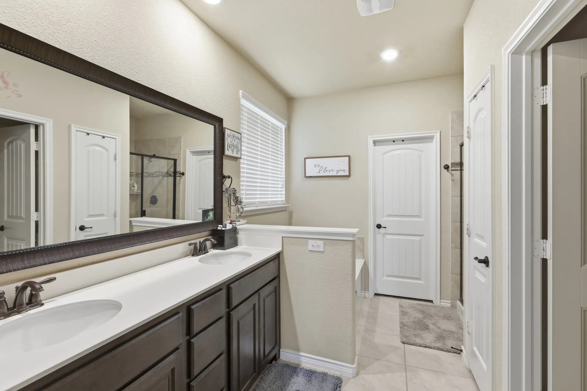 Ensuite bathroom with dual sinks, garden tub, seperate shower and walk-in closet!