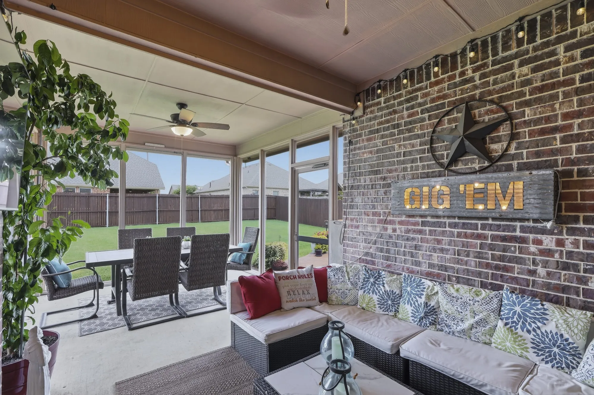 Large enclosed sunroom great for entertaining or outdoor dining!