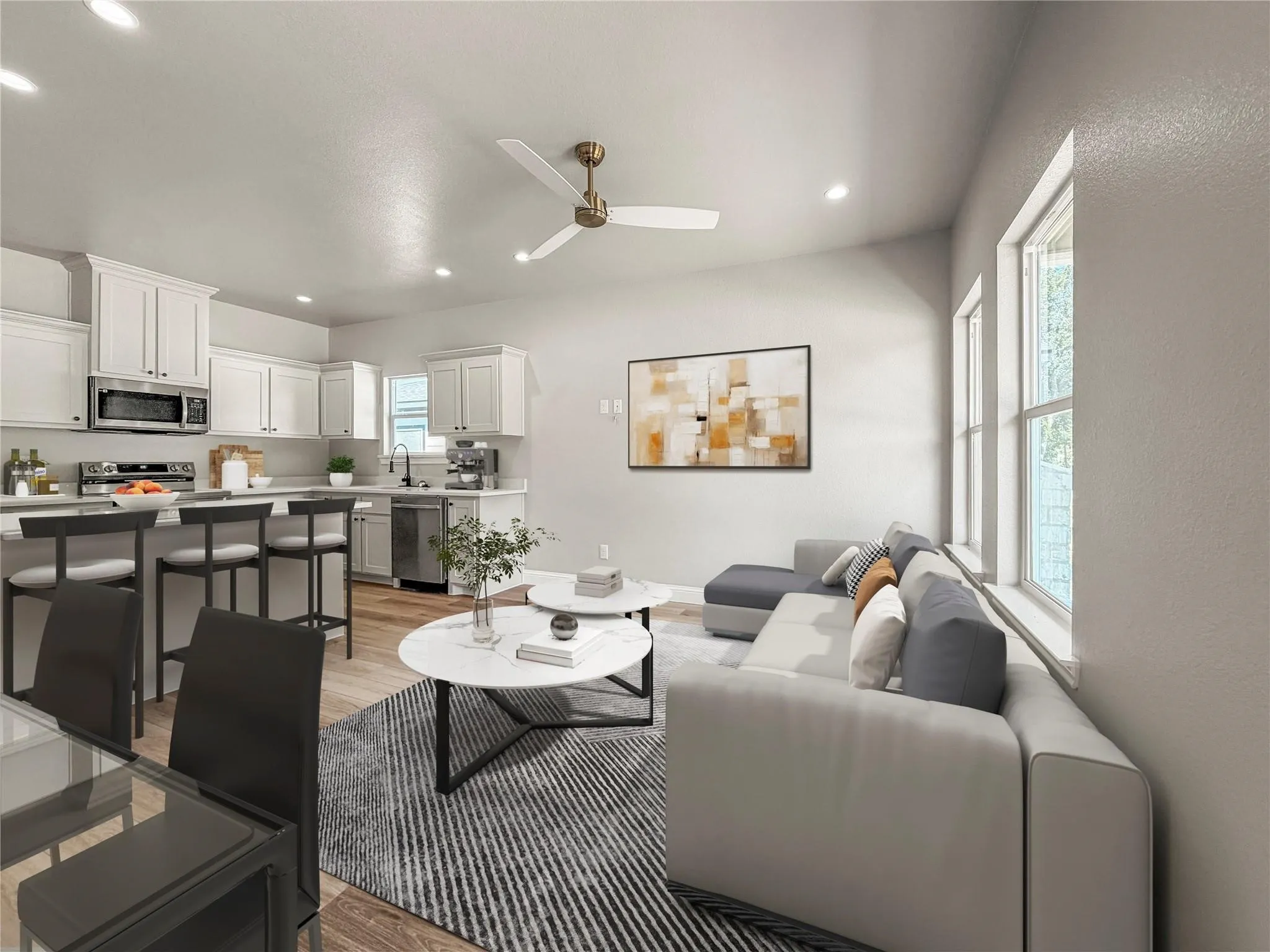 Contemporary kitchen with white shaker cabinetry, stainless steel appliances, a center island, light-toned countertops, and wood-finish flooring