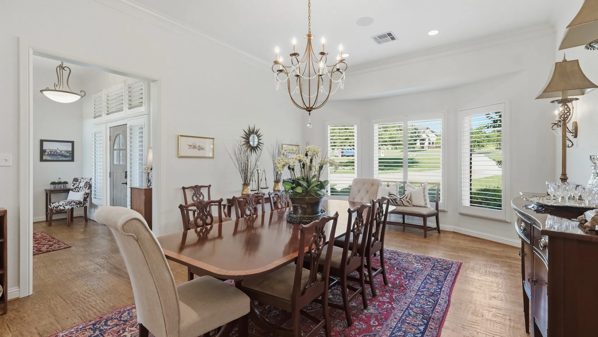 The chandelier and the two wall scones do not convey, the ones shown here in this photo have been replaced with new ones.