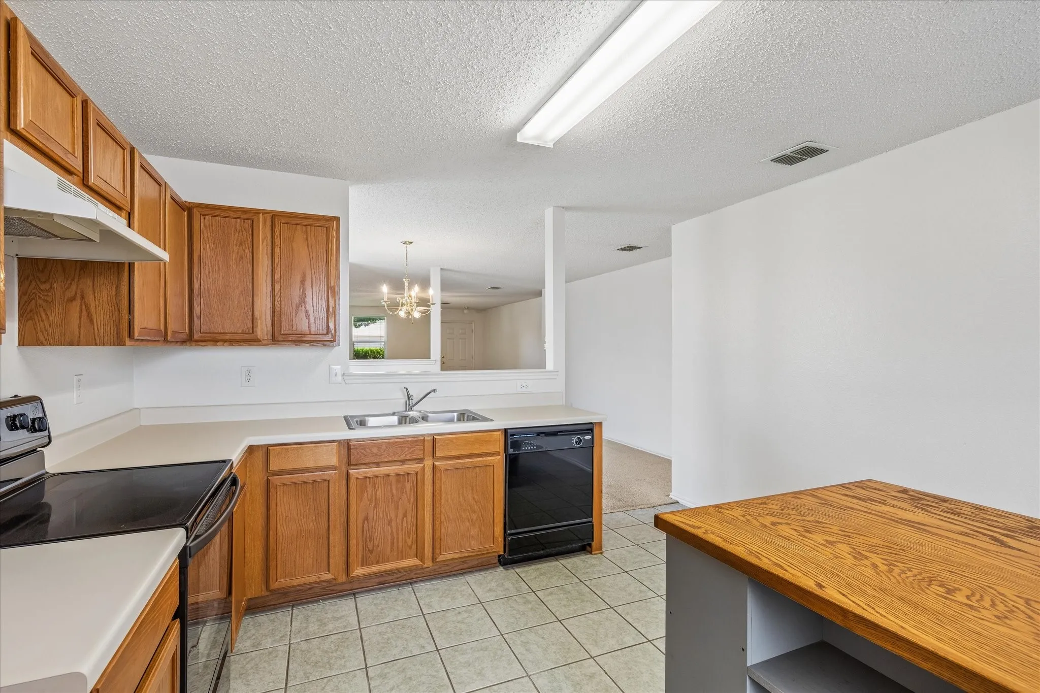 There is a large walk in pantry adjacent to kitchen