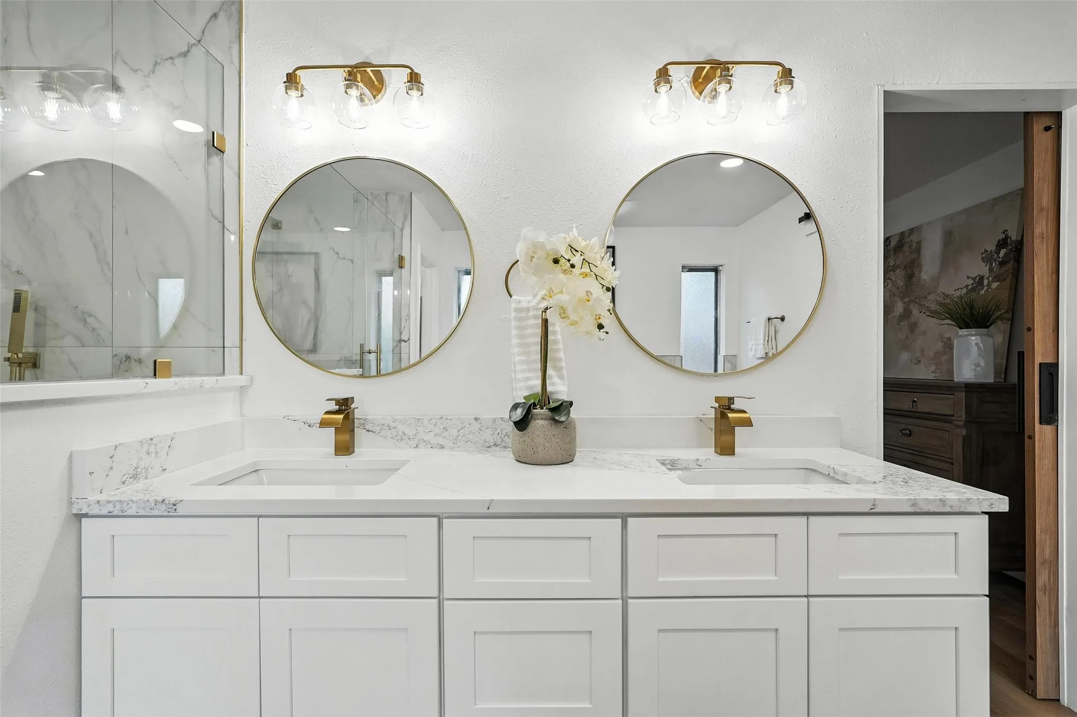 Full bath featuring double vanity