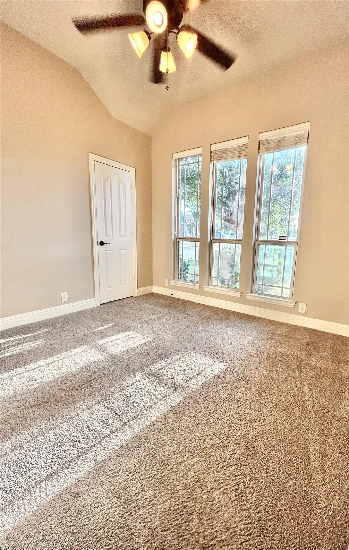 Front room- designed to be an office, but can be utilized as a work out room, play room, or 4th bedroom as needed!