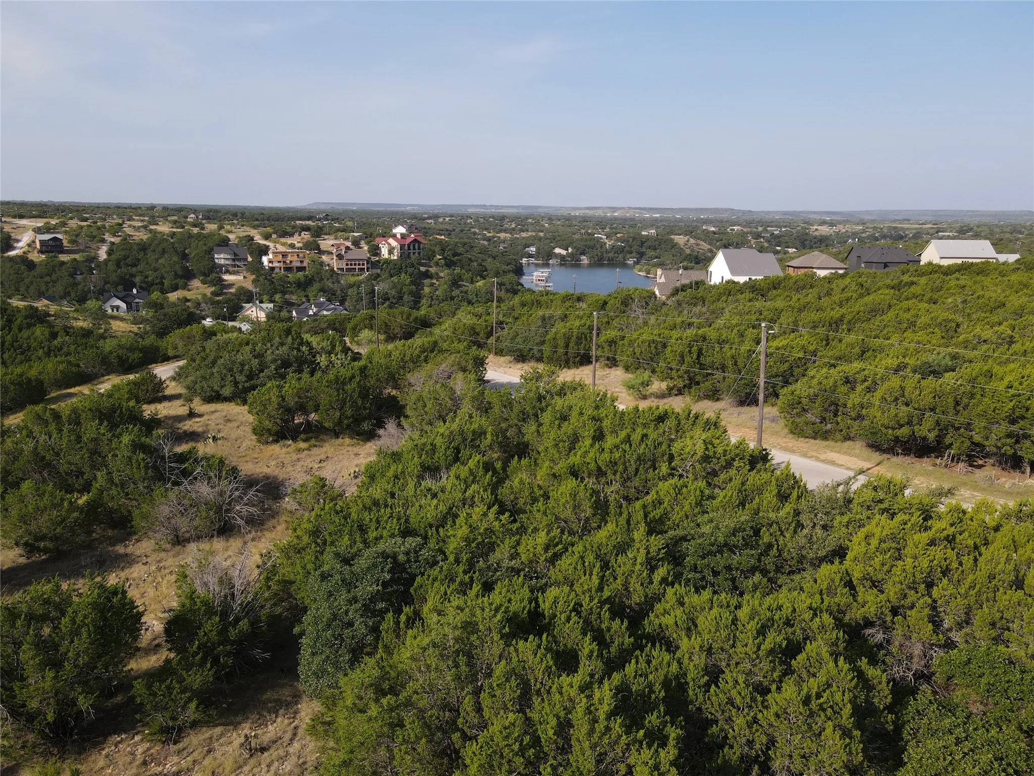 Expansive natural landscape with varied terrain and dense green foliage