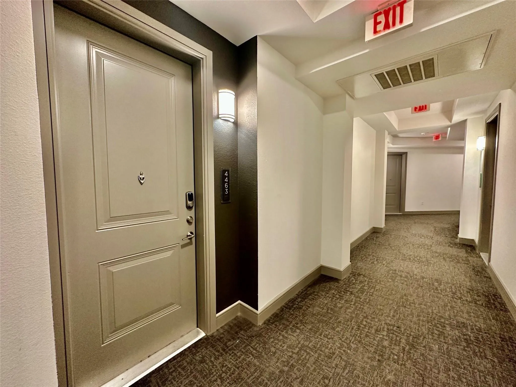Entry door with panel detailing and smart lock system