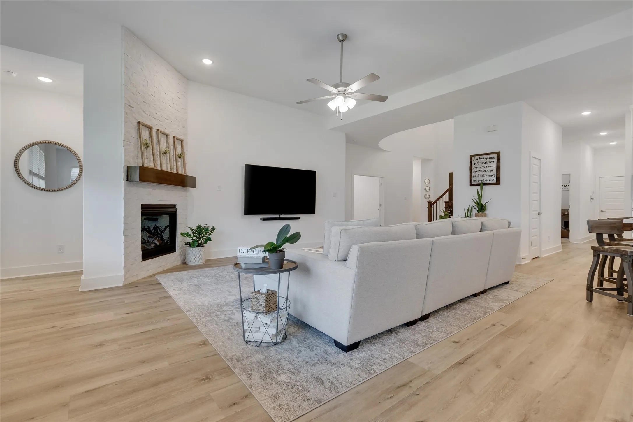 Engineered hardwoods throughout main living areas.