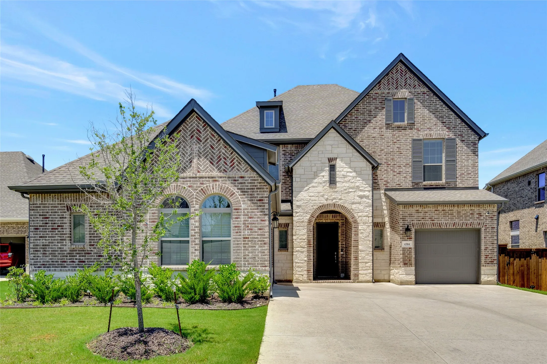 This like new home has curb appeal galore with stone entrance, 3 car garage and oversized driveway.