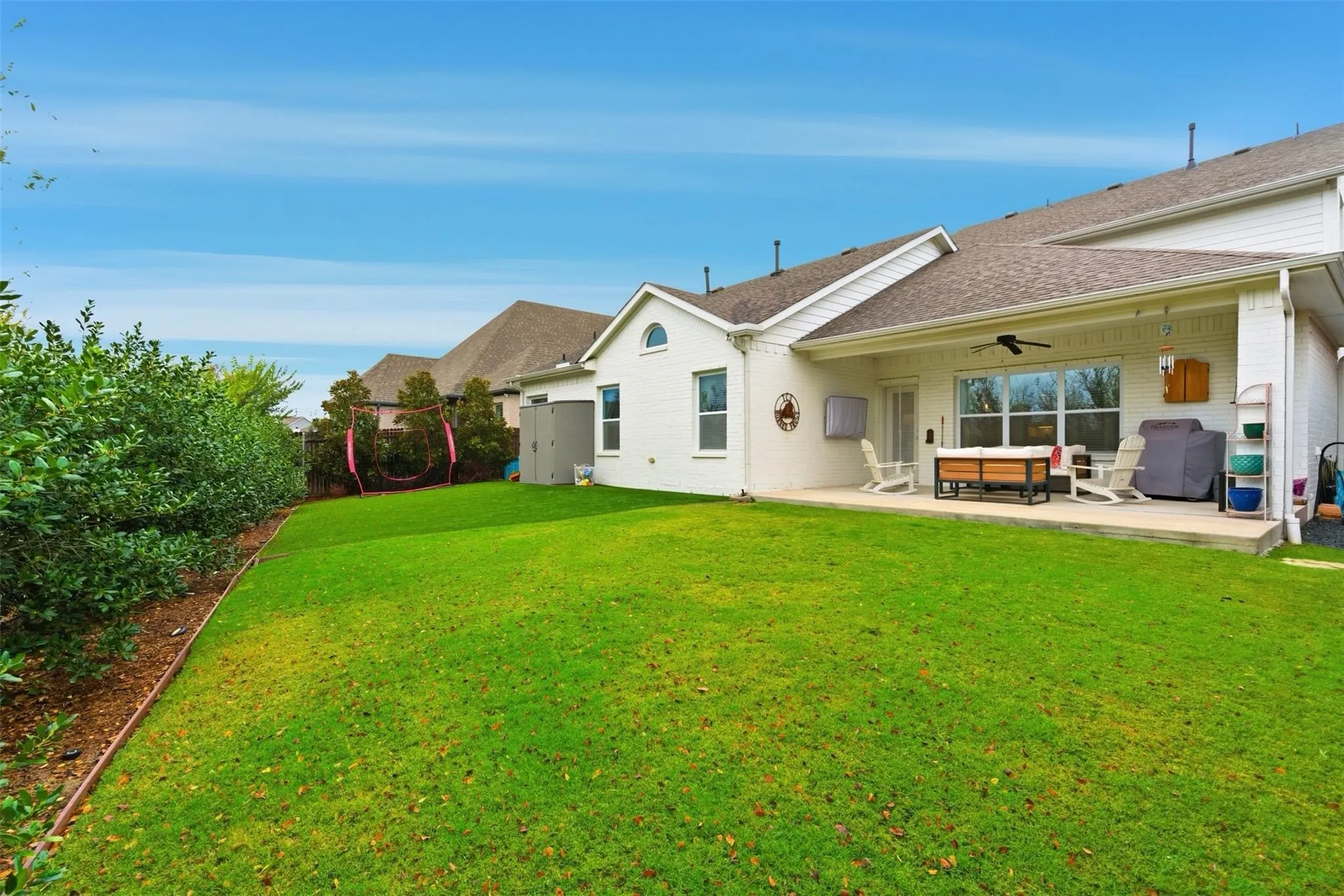 Partially turfed backyard, landscaped and private