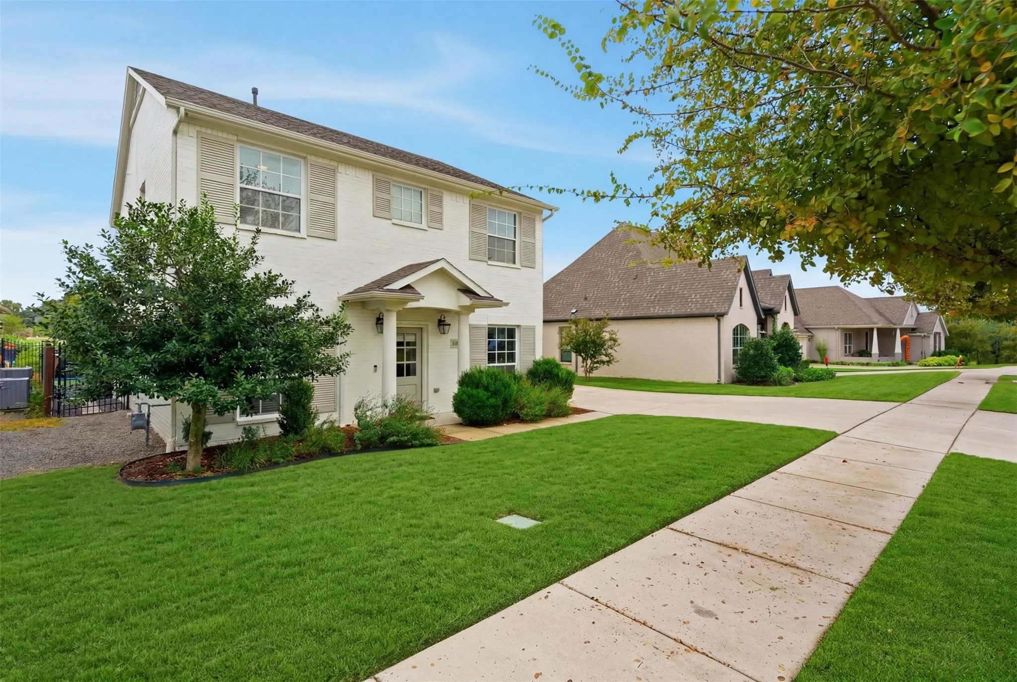 Tucked into a quiet nook of the neighborhood, just a few doors down from another large green space