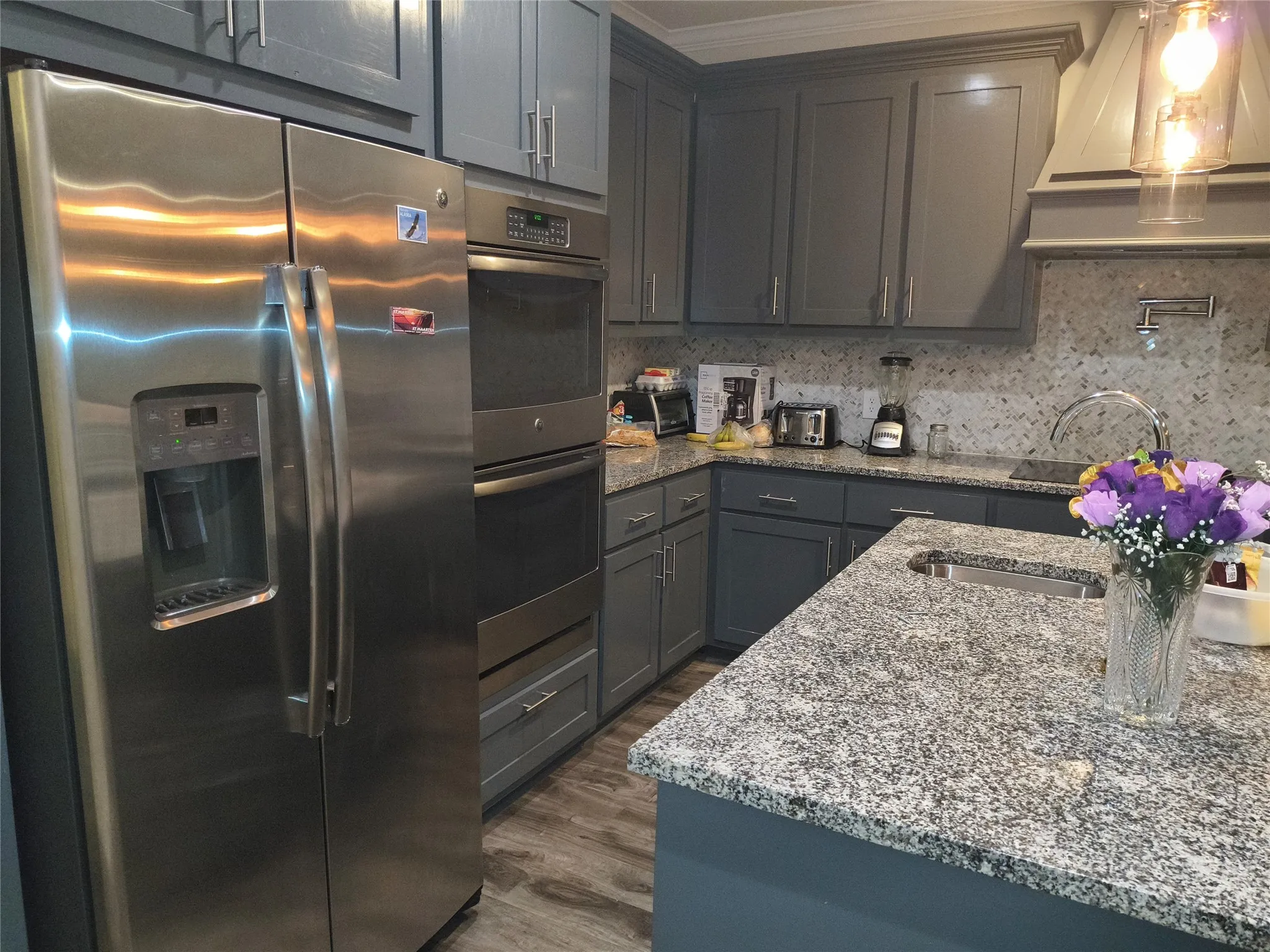 Kitchen featuring double oven
