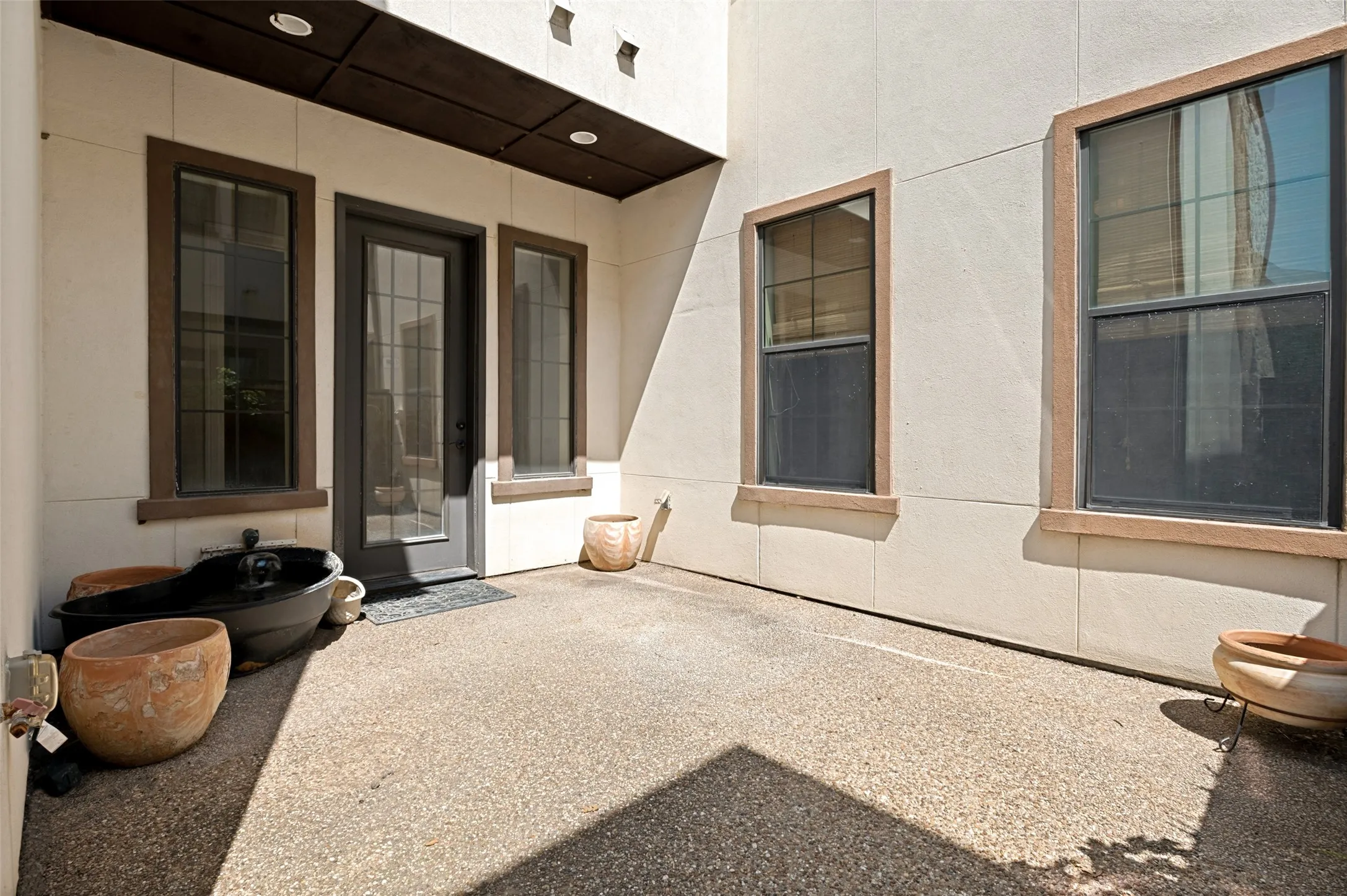 Rare interior courtyard offering a distinctive outdoor setting that enhances the home’s open and inviting atmosphere.