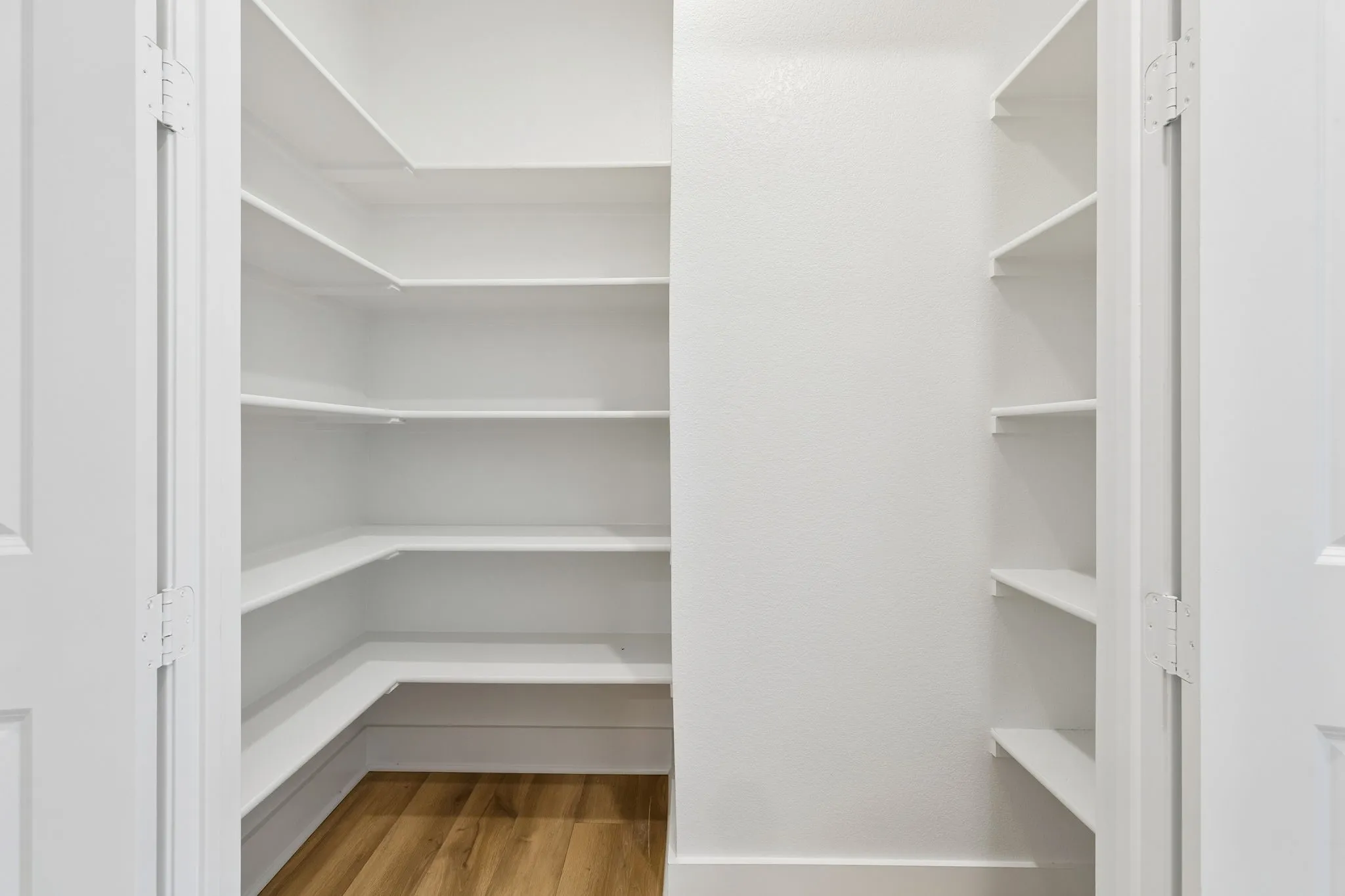 So much storage in this home! This is the hallway closet across from the secondary bath and just 1 of 3 closets meant for storage