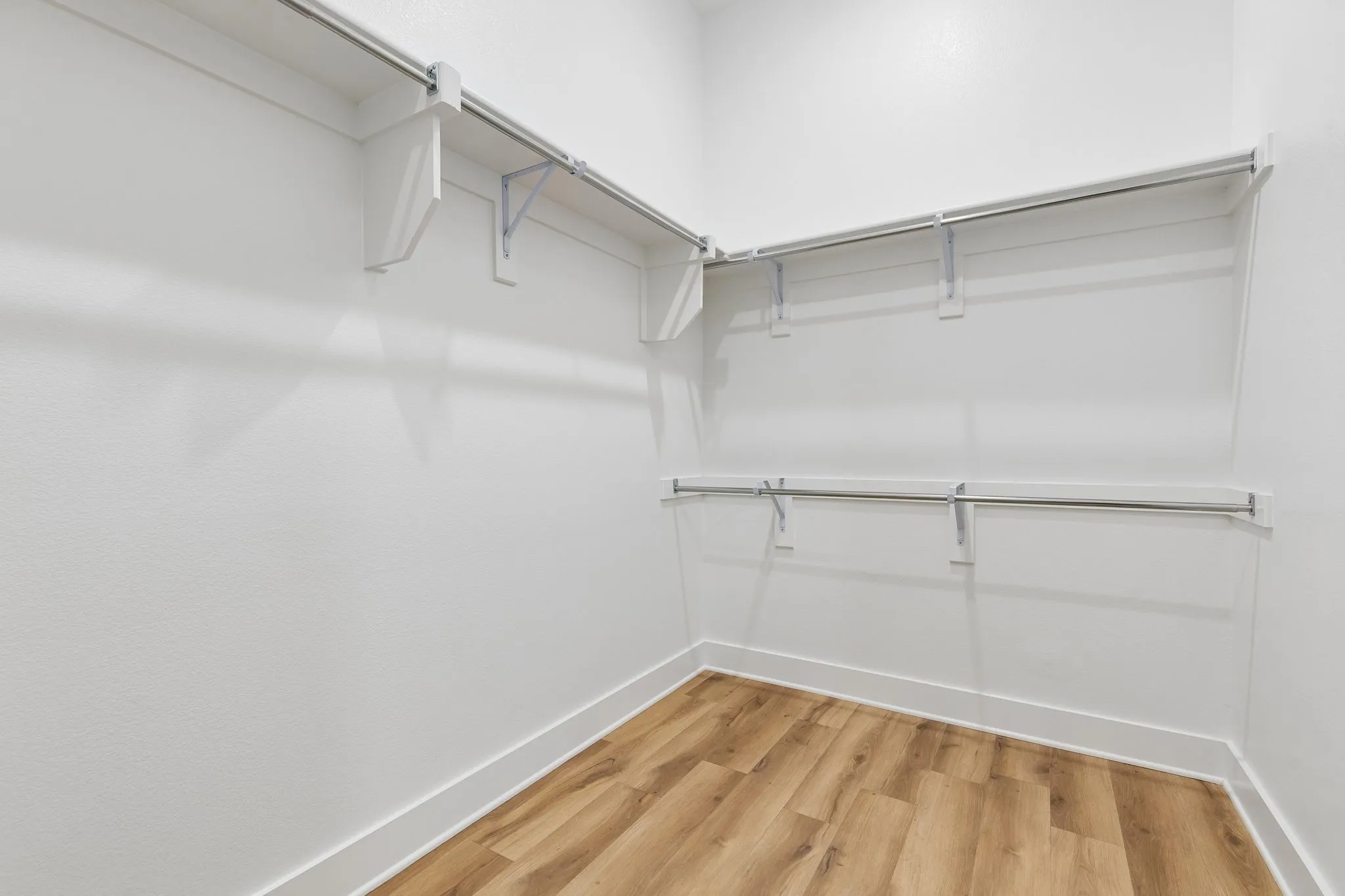 Large walk in closet that flows easily into the laundry room.   This is an upgrade from the original Highland home floor plan