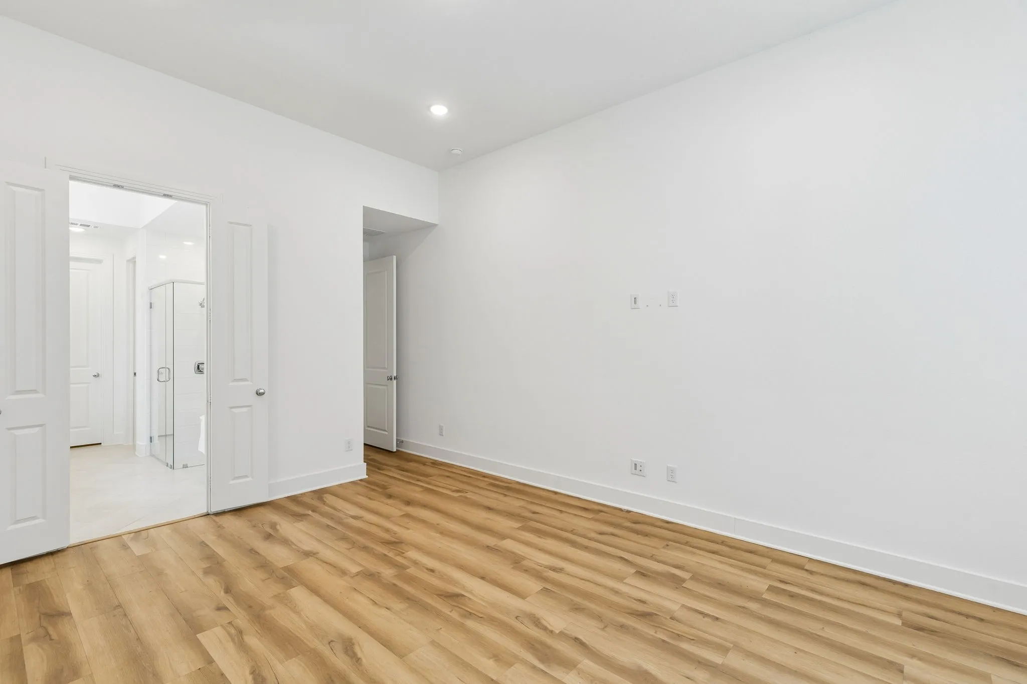 View from master bedroom into master bath