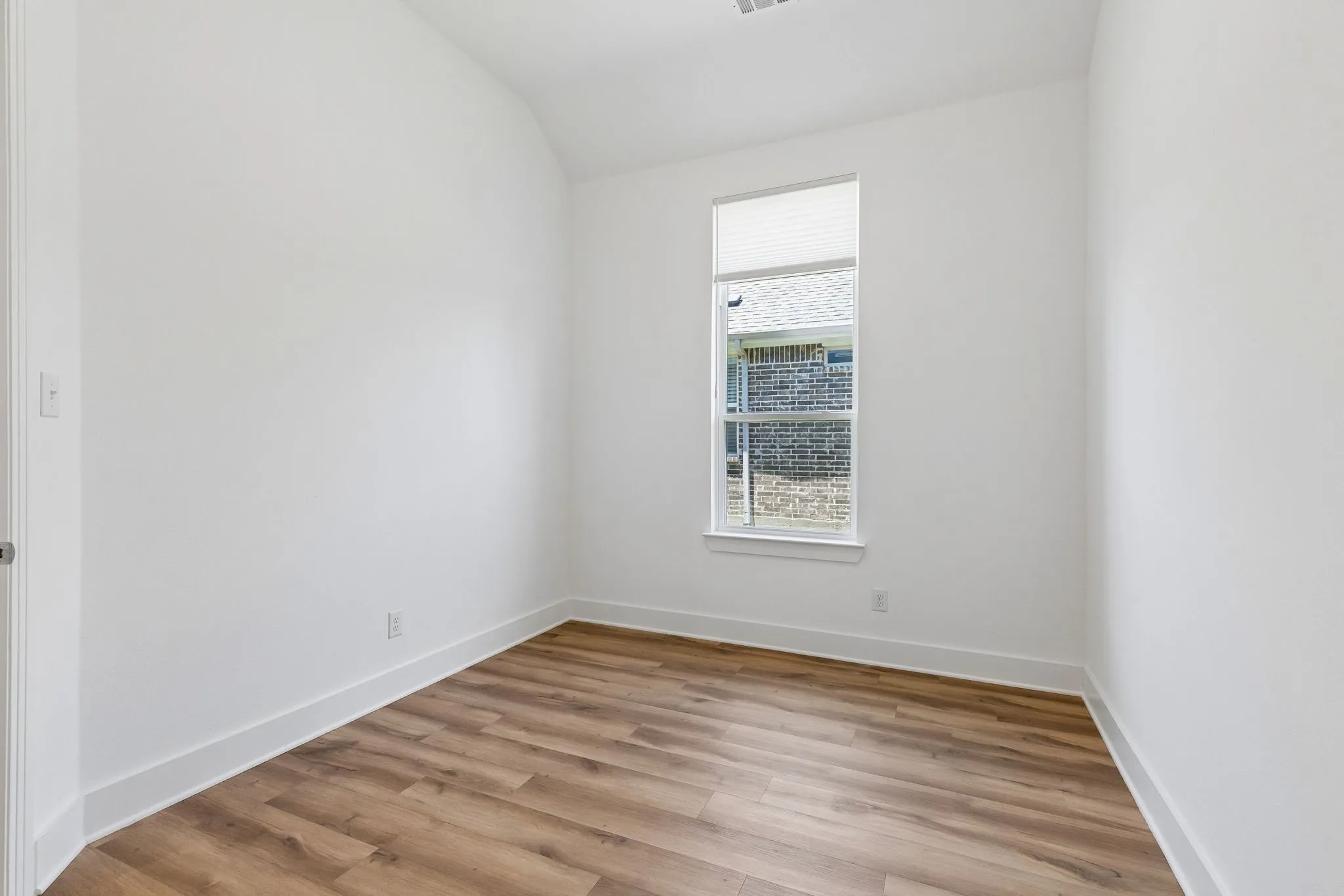 This 3rd bedroom is is 13 x11.  Picture makes it appear small however it is large enough to fit a queen sized bed