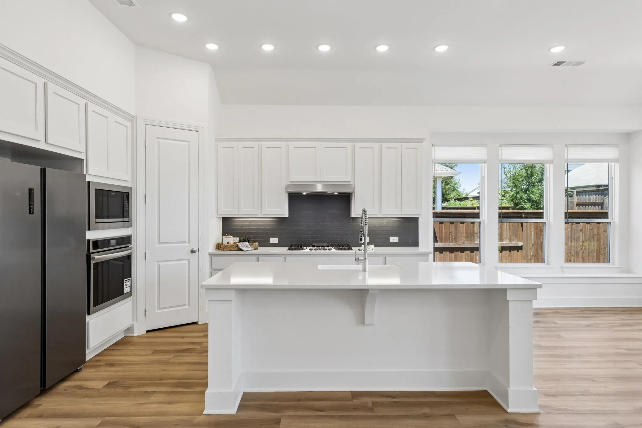 Beautiful Granite countertops.  Appliances still have the stickers.   Fridge and Washer and dryer may convey with an acceptable offer.