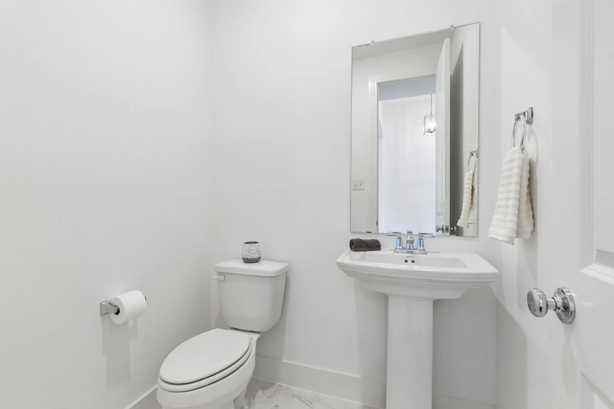 1/2 bath perfectly placed next to the front office