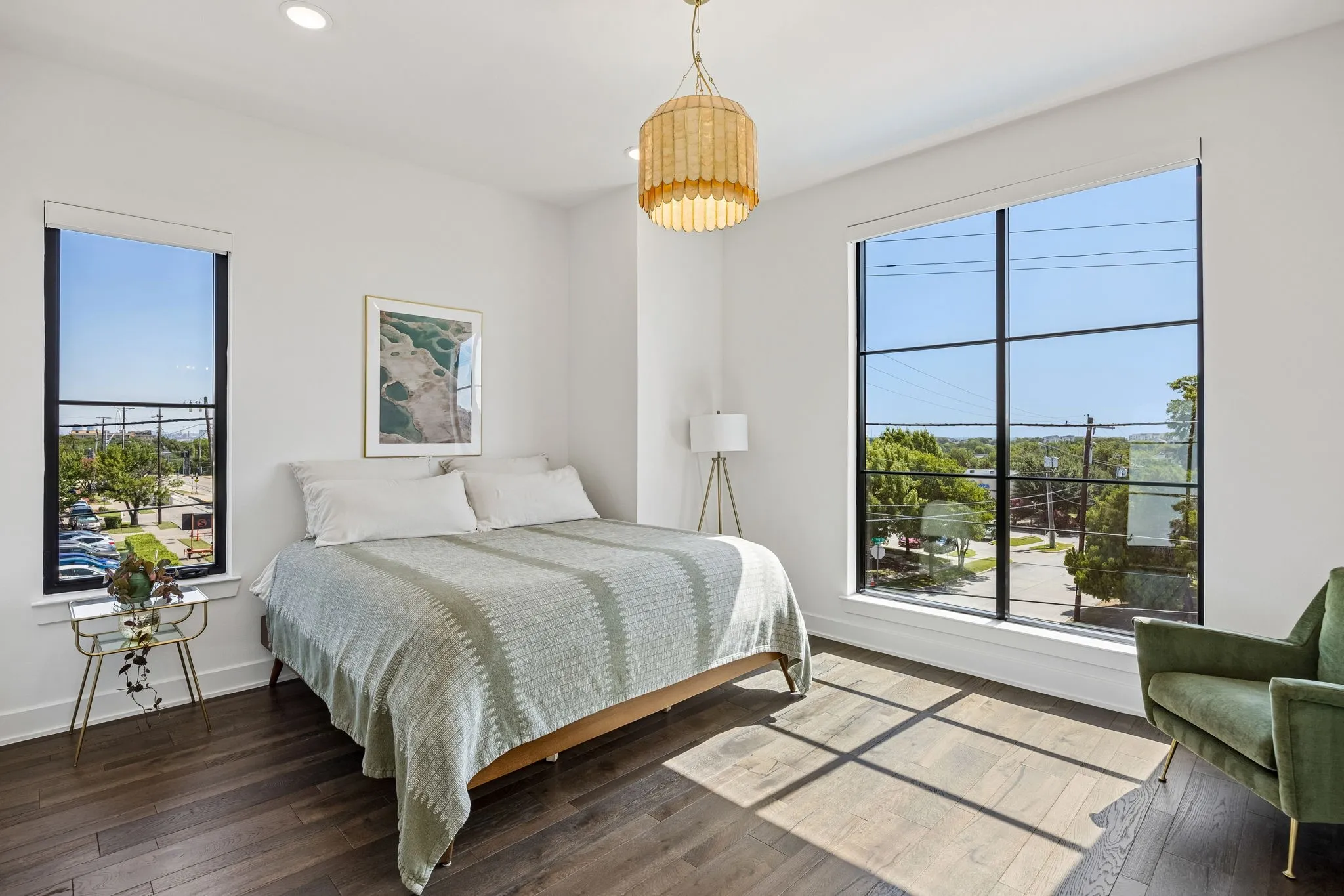 Primary bedroom is a true escape with floor with great light and views of Downtown Dallas.