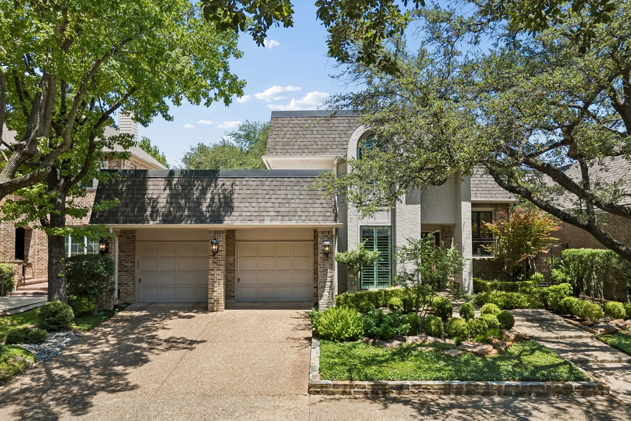 Stunning mature tree canopy give this home a stately yet inviting vibe.