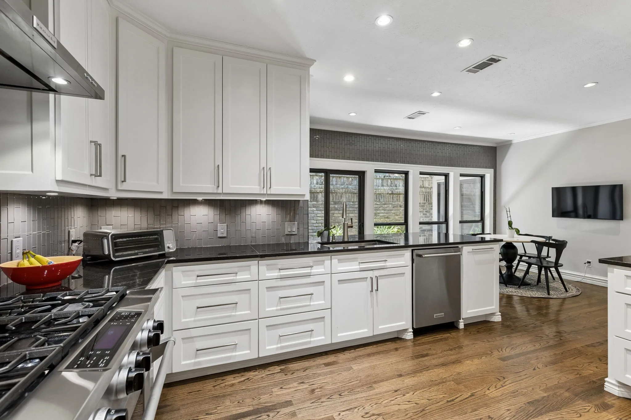 Functional, stylish, and spacious kitchen with extended cabinetry, soft close drawers, and great prep space.