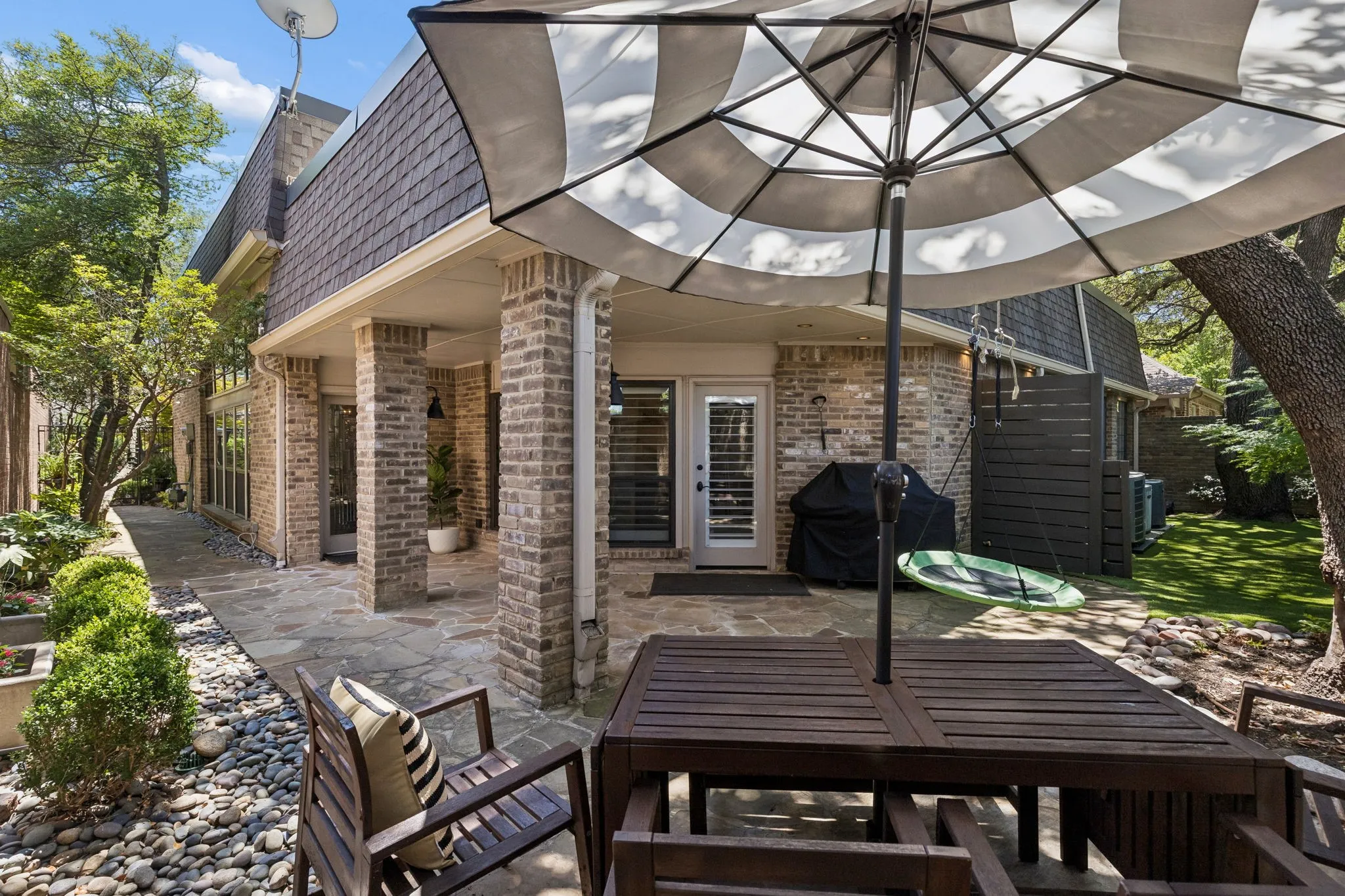 Another view of this cozy, low maintenance backyard.