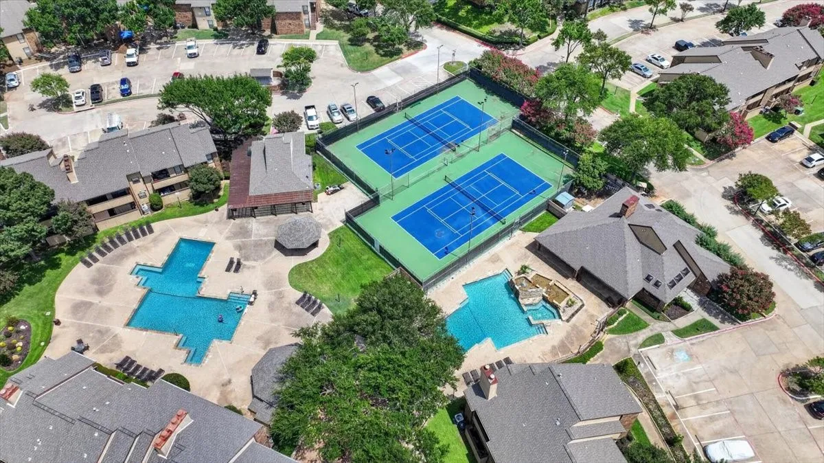 Outdoor amenities including two tennis courts, two swimming pools, and a covered gazebo