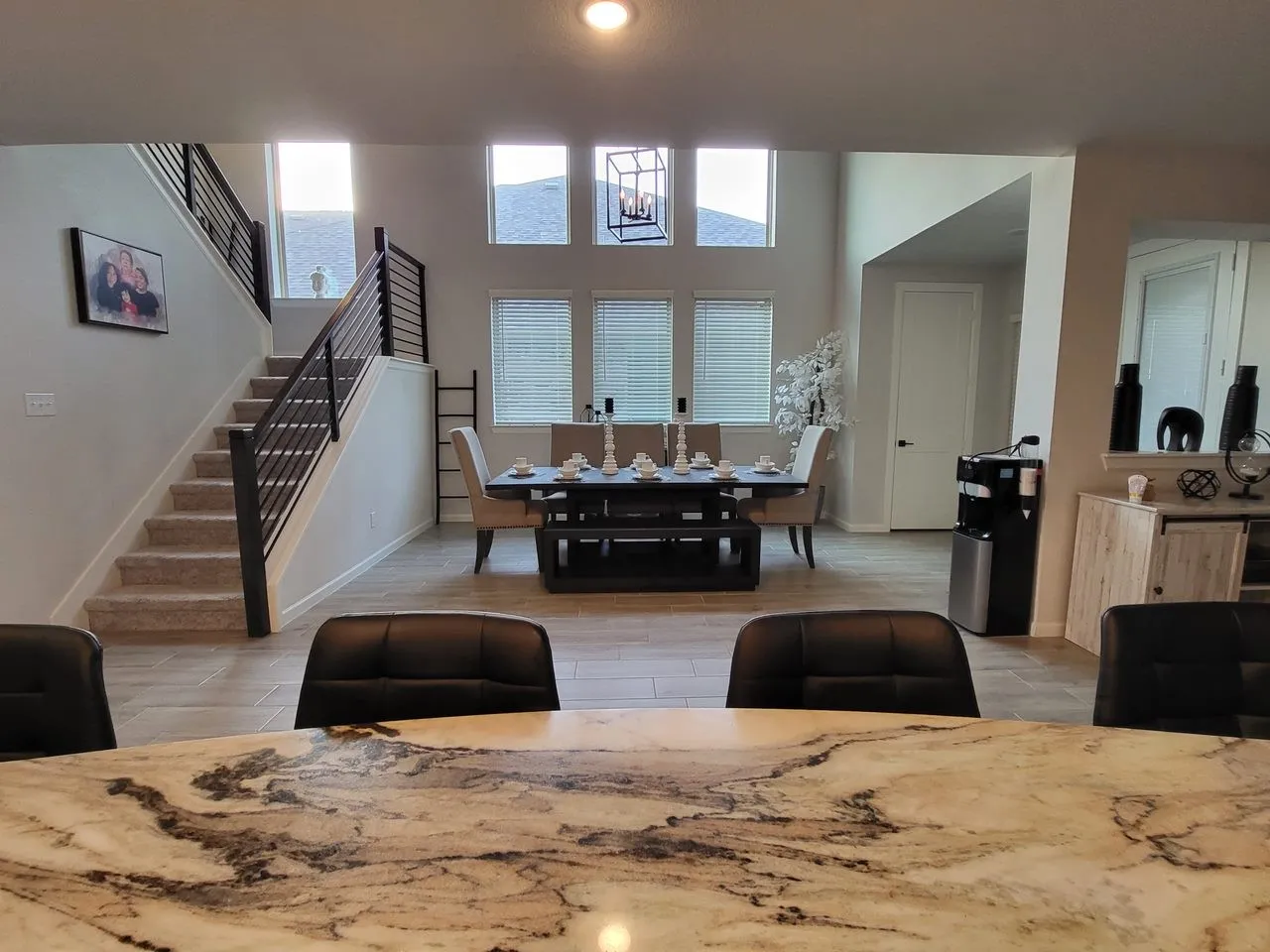 Dining room with a towering ceiling