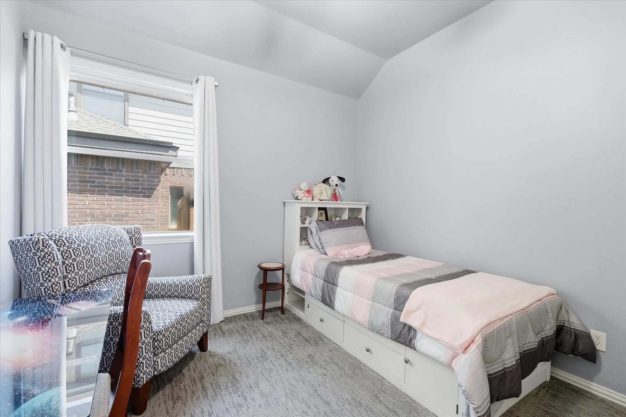 Window with white trim and white curtains