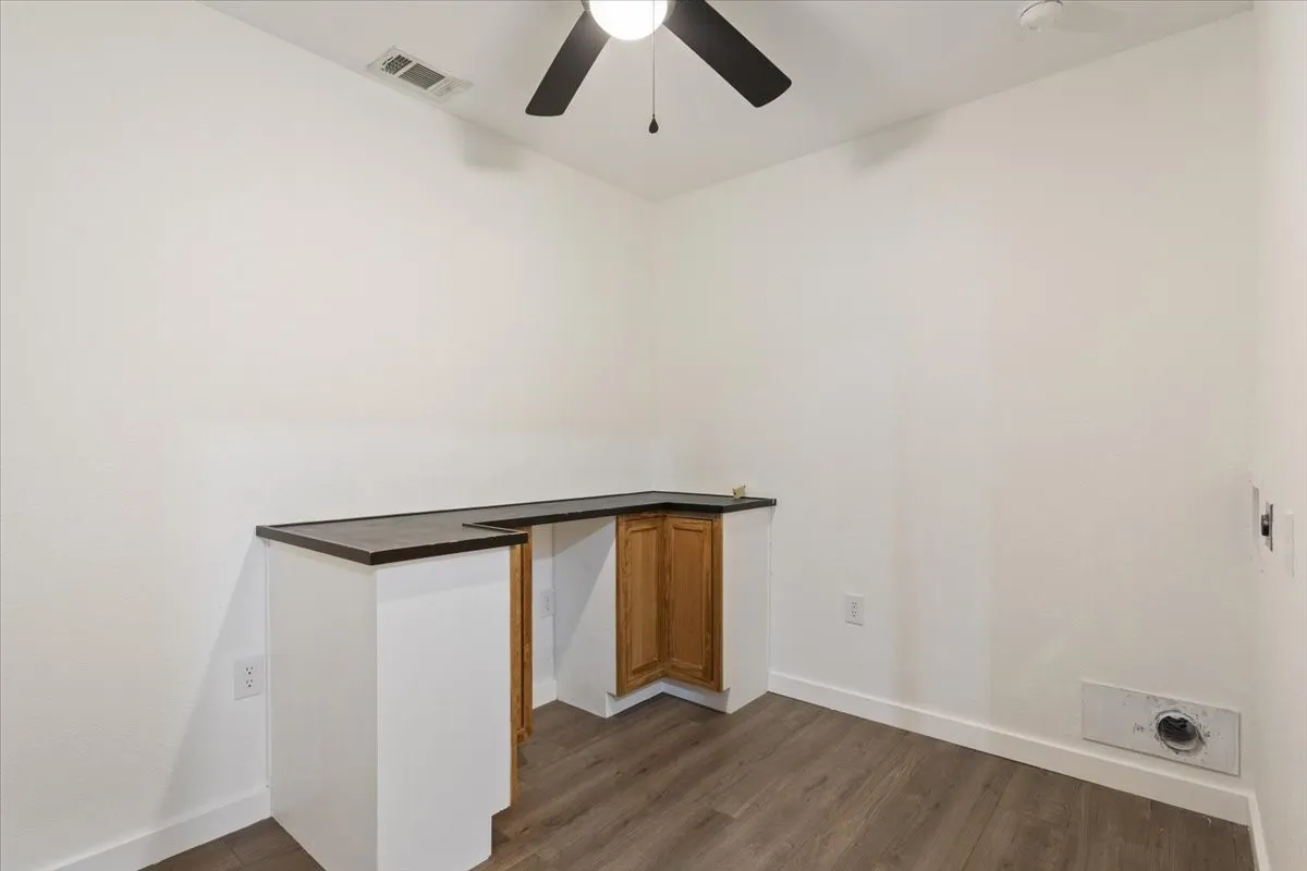 Laundry room off of kitchen.