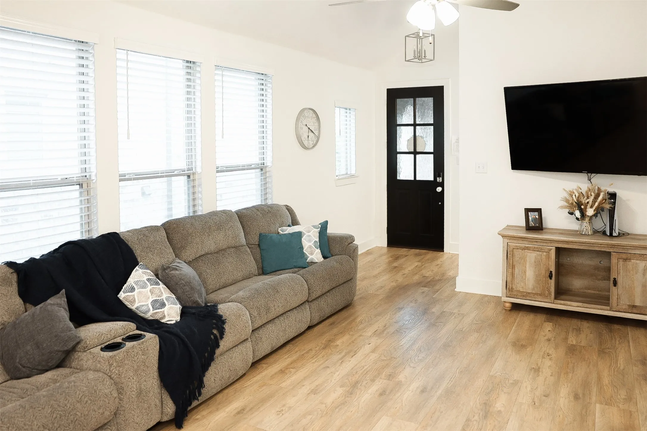 Spacious interior with light wood-finish flooring