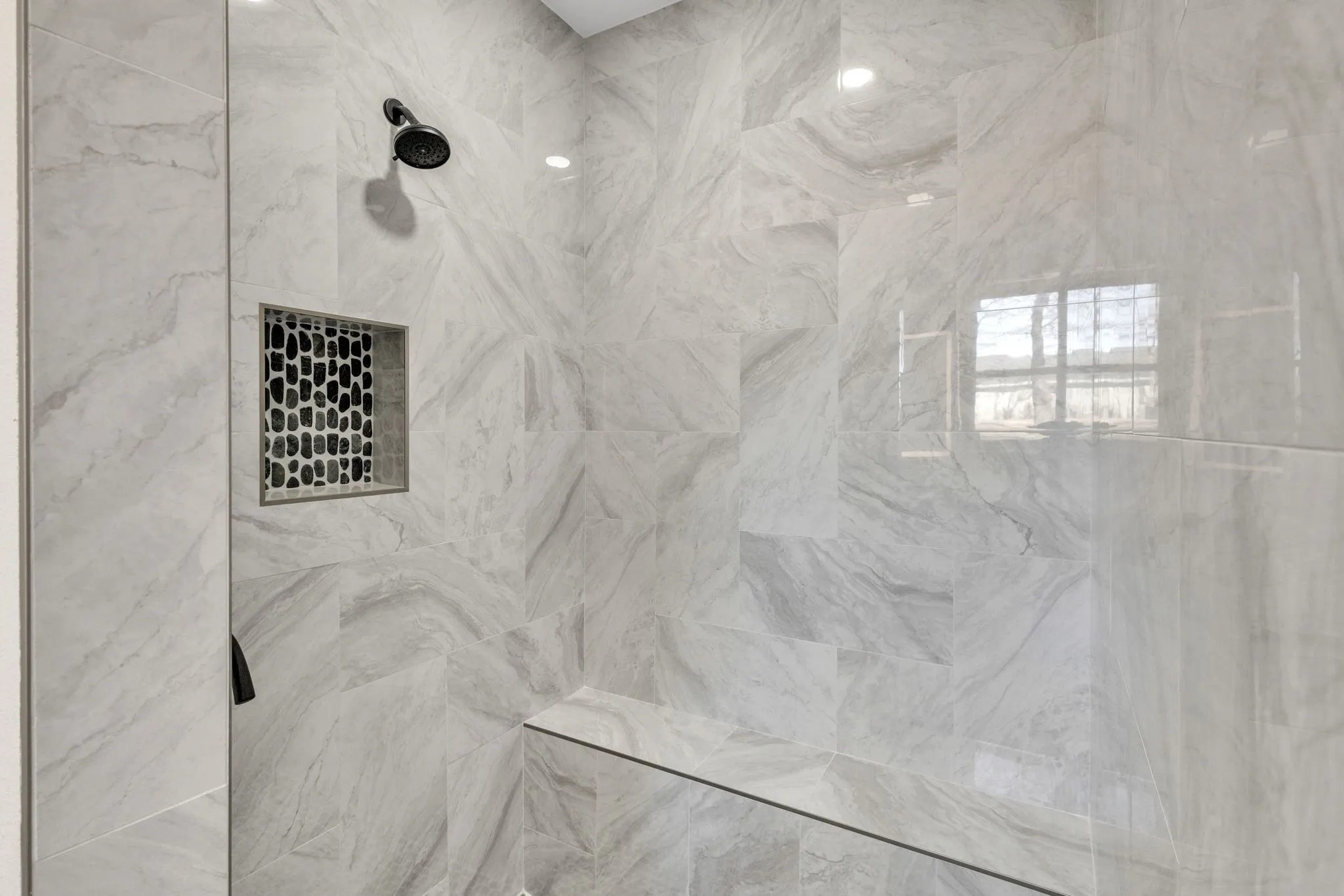 Interior details with a tile shower