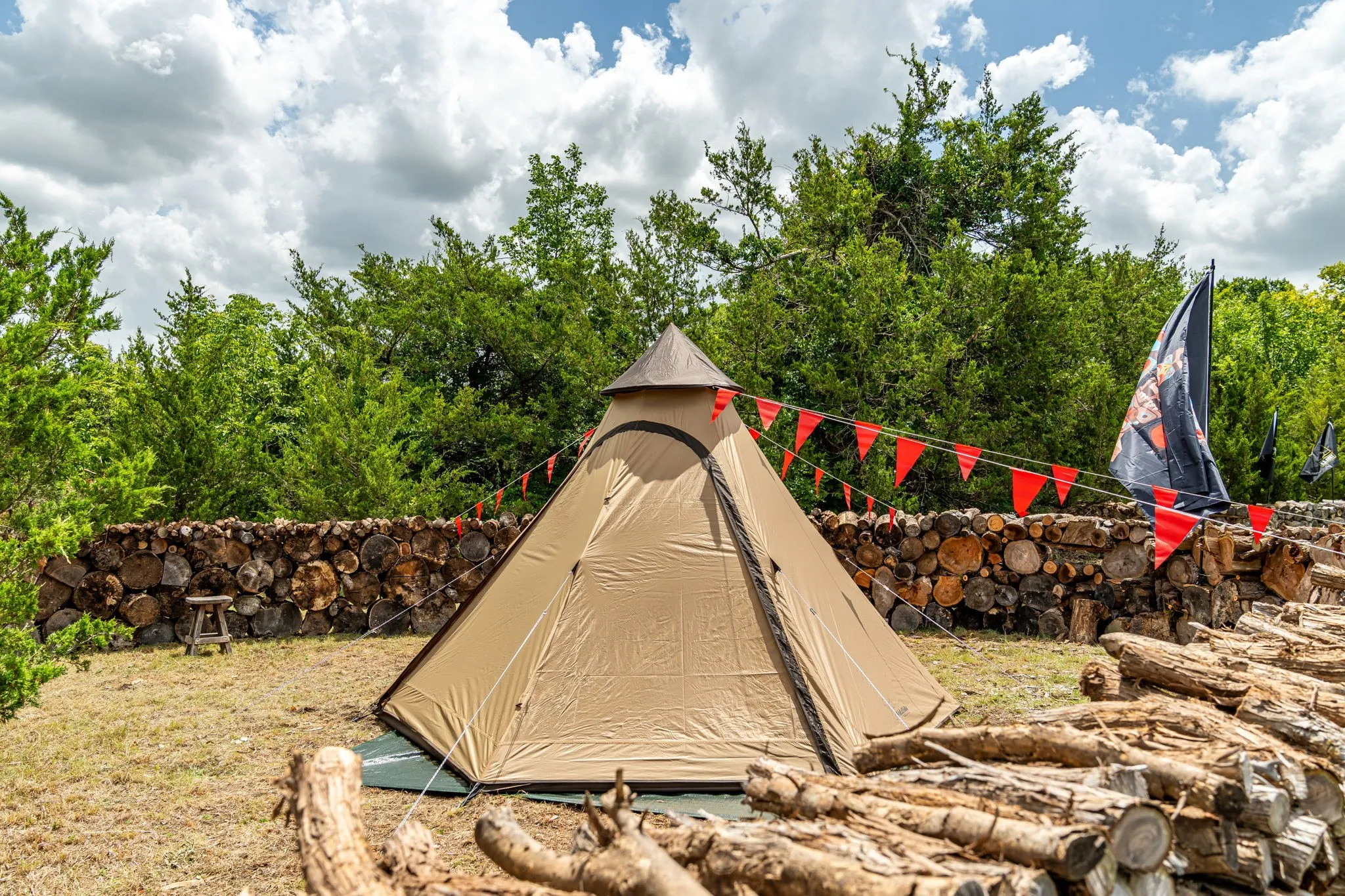 Keeping the history of Choctaw Creek and history of the area, a fun area with teepee & fort are present - great for children to play.  Logs from trees are stacked to provide more to the playful setting.