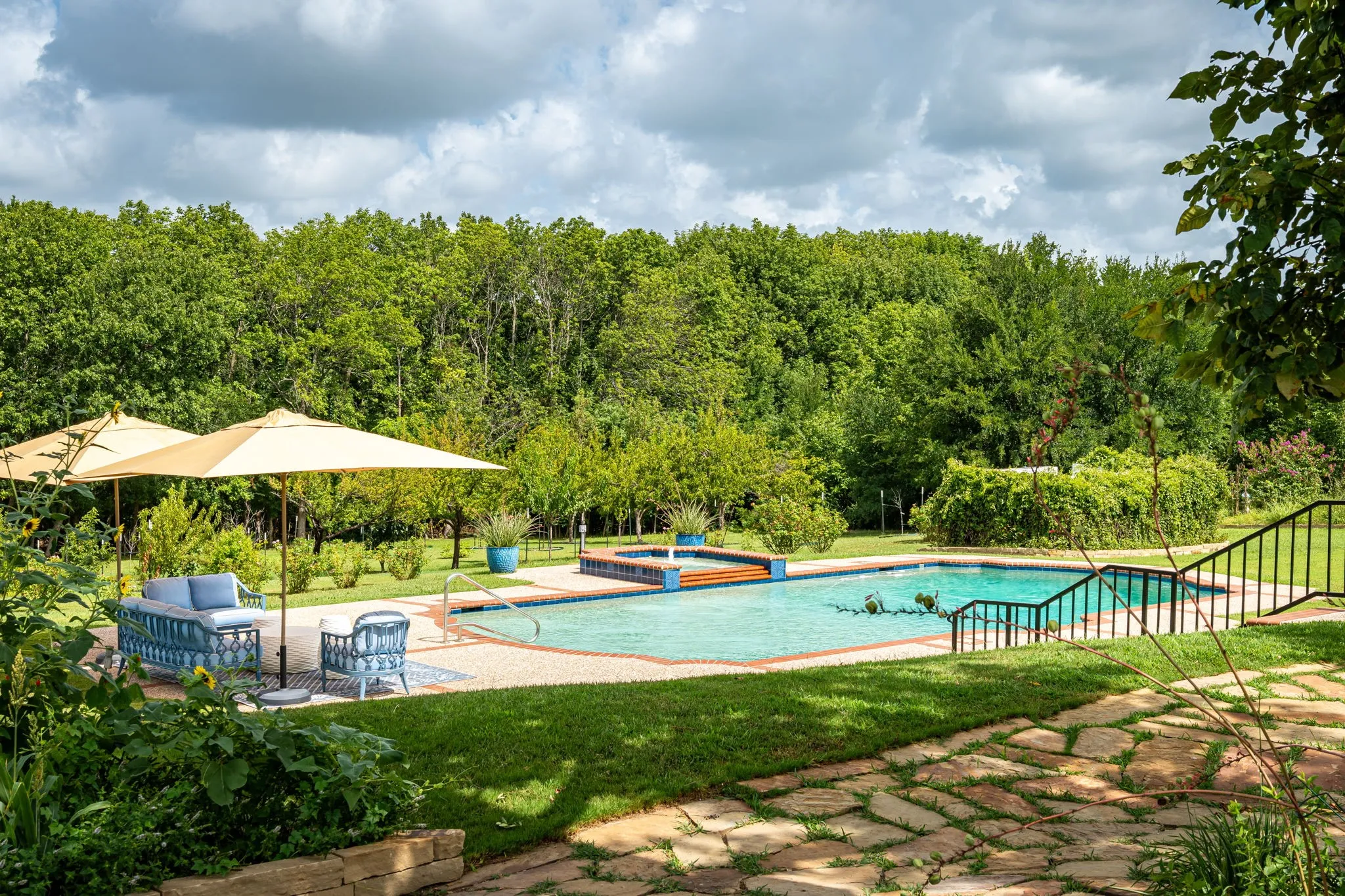 This Sanders gunite swimming pool is 20 ft x 42 ft saltwater with waterfall & fountain.  The pool is surrounded by Koolkrete surface.  The deep end of the pool is 12 feet.  The pool was totally redone including hammering out the guinte in August 2024 and detail & photos of the work is available upon request.  The pool has a polaris cleaner.  The setting & view is exceptional.
